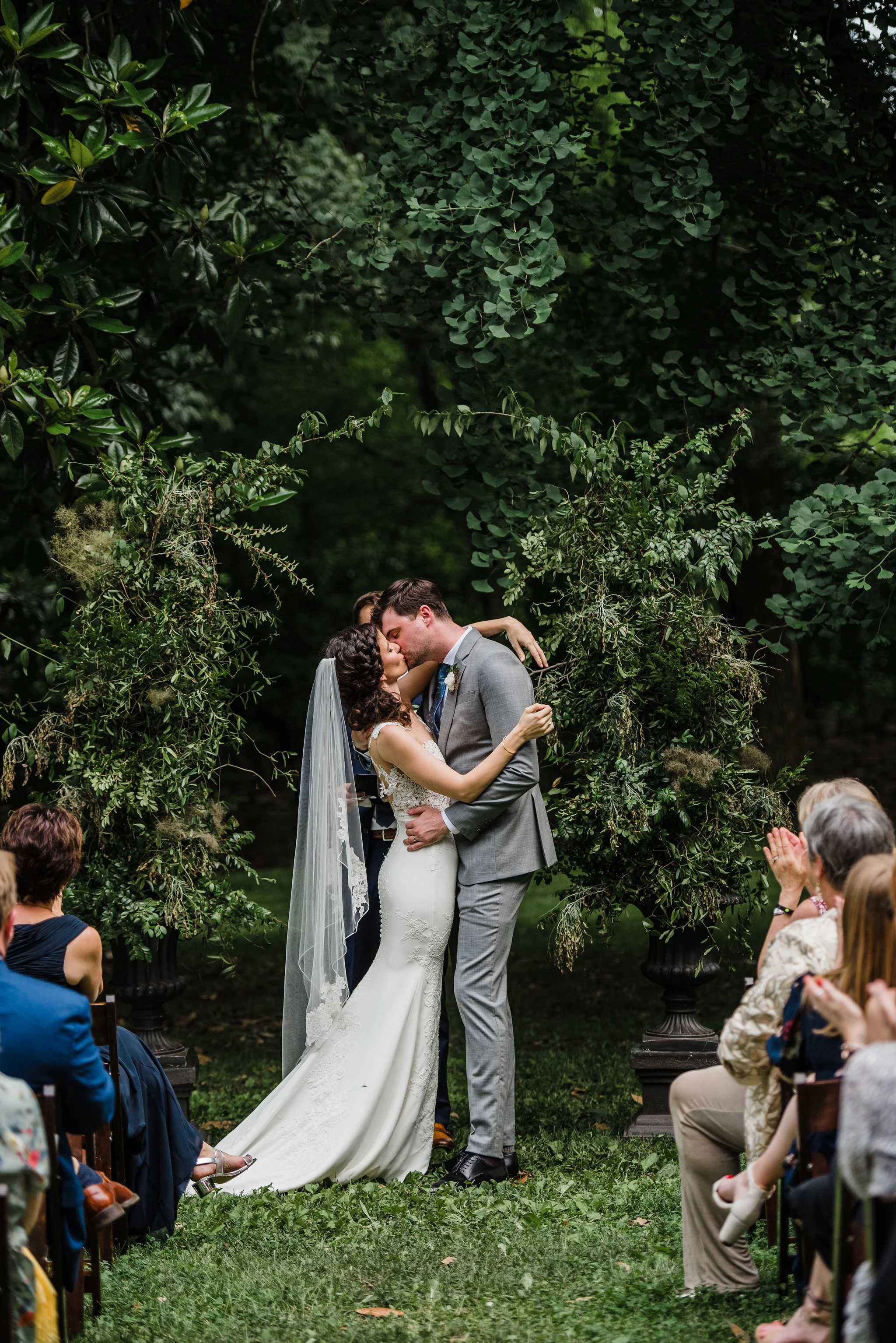 Organic greenery arch for the wedding ceremony // Art deco inspired garden party wedding in Nashville