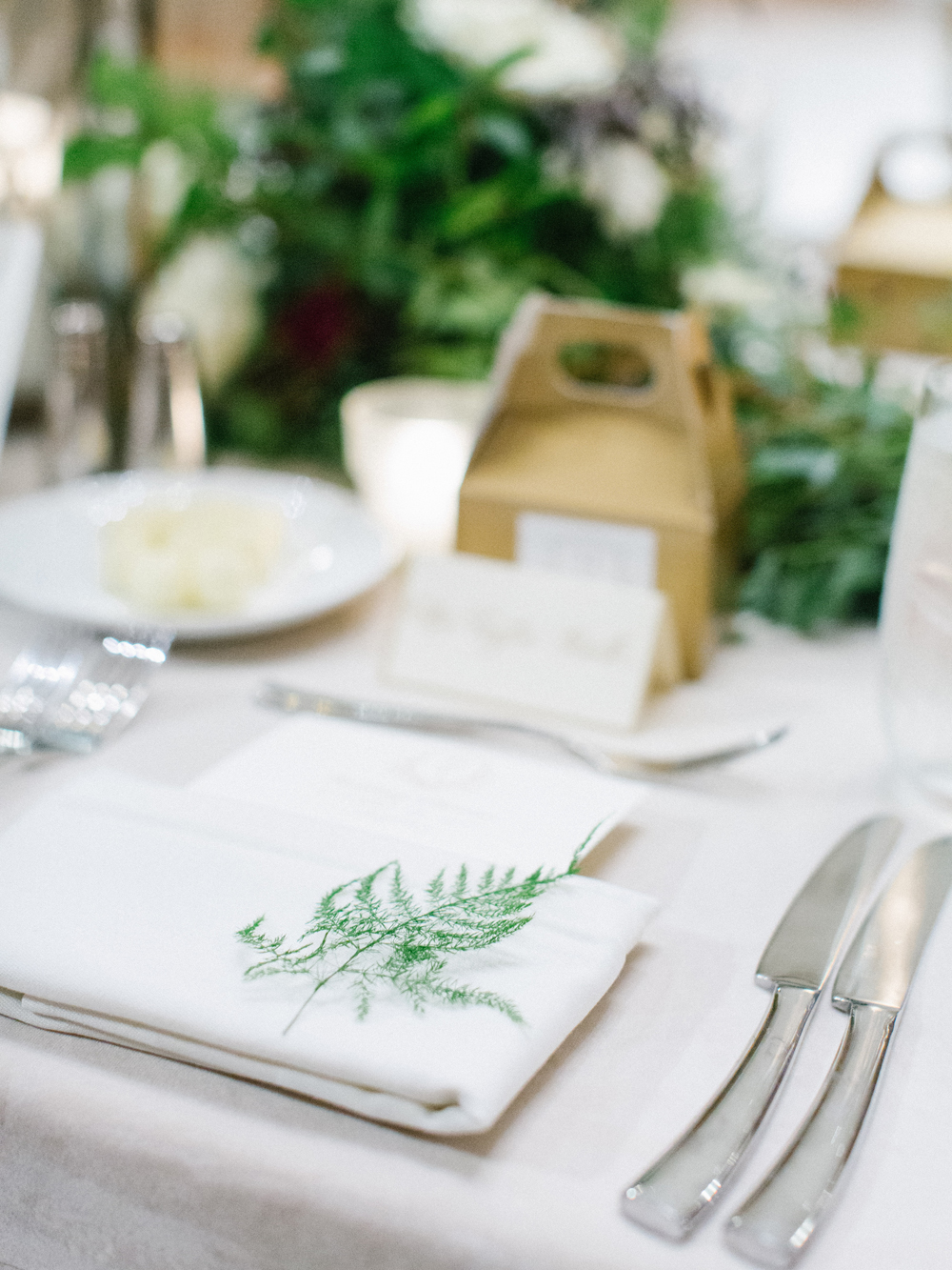 Airy sprigs of greenery for each place setting // Nashville Wedding Florist