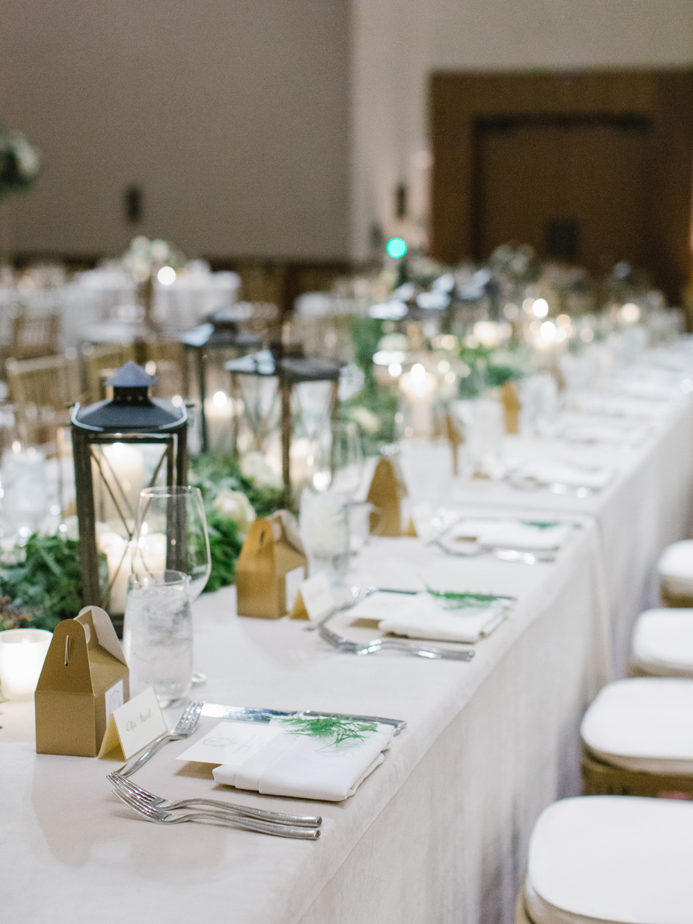 Head Table with lanterns and greenery garland // Nashville wedding floral design