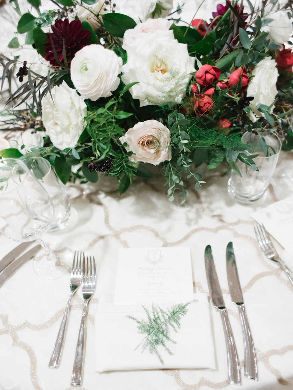 Airy greenery sprig for each place setting