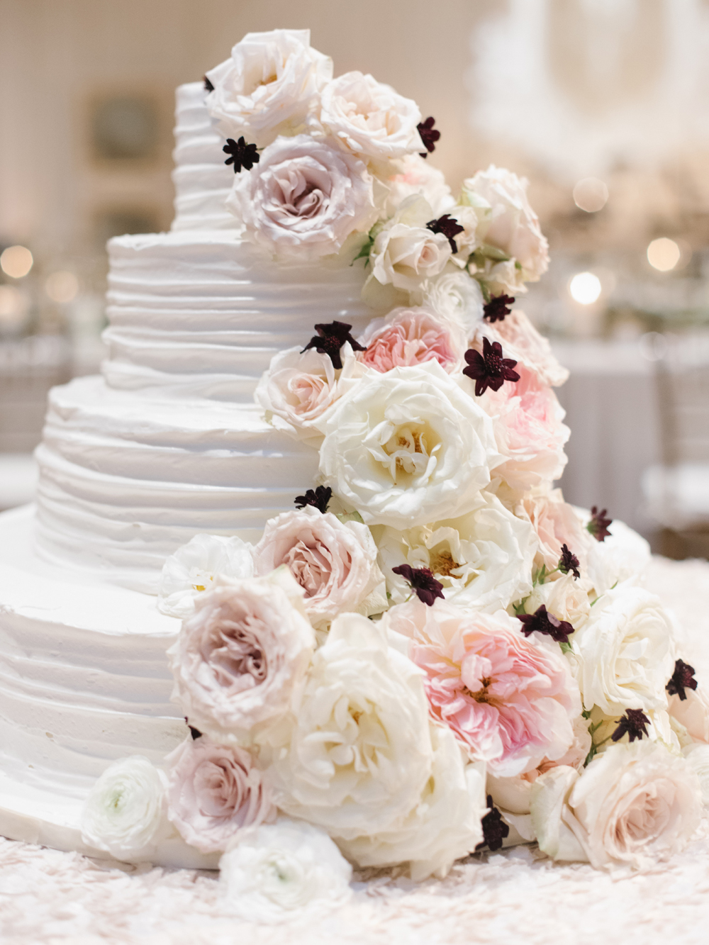 Lush cake flower cascade // Nashville Wedding Florist