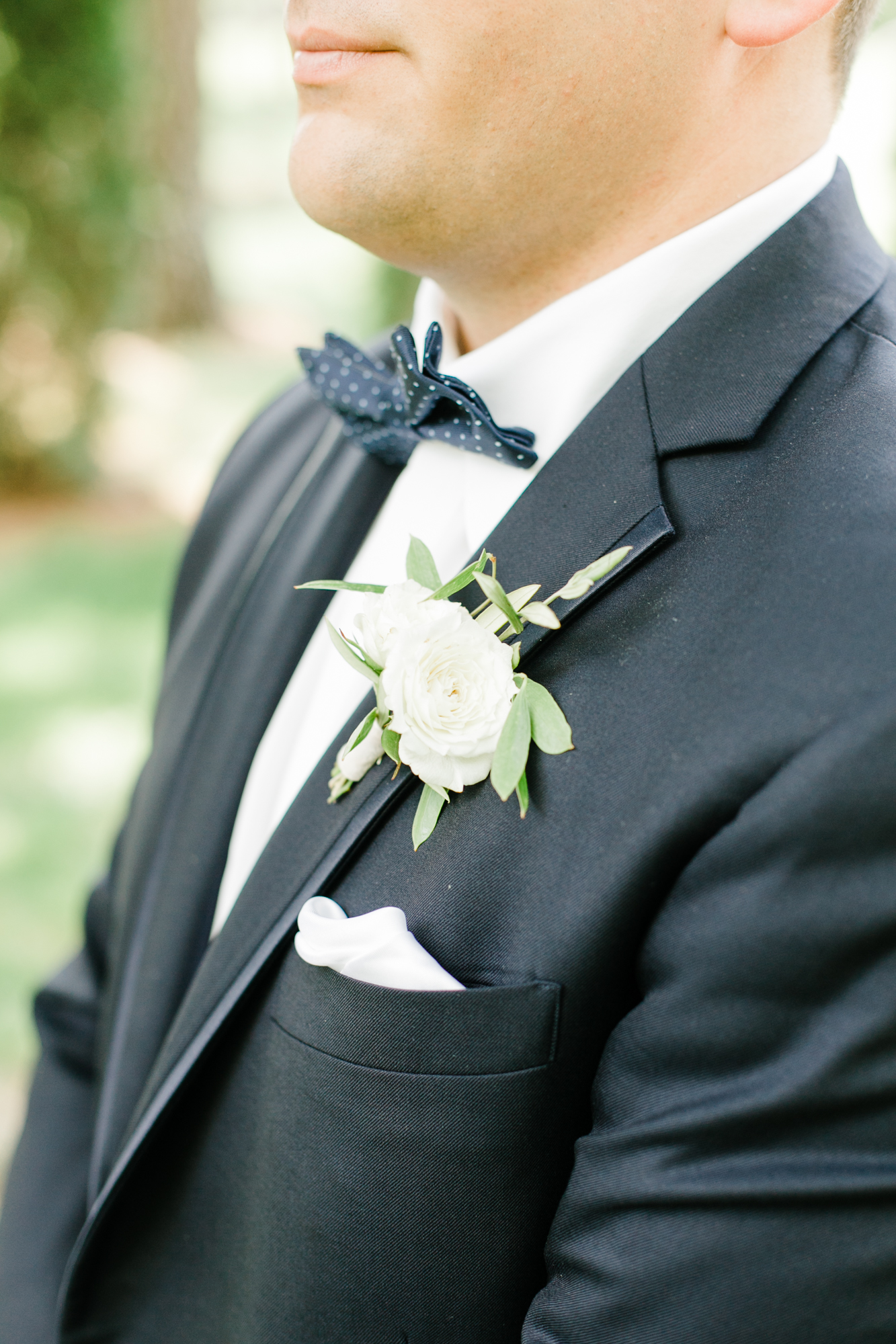 Simple white and greenery boutonniere // Nashville Wedding Flowers