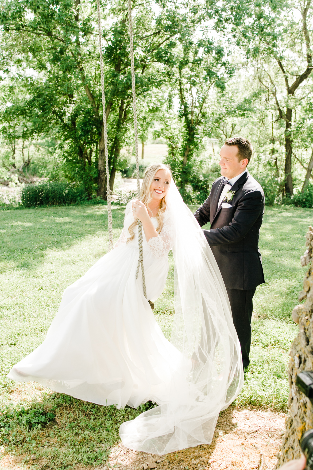 Bride and groom portraits at the tree swing // Floral Design at Long Hollow Gardens