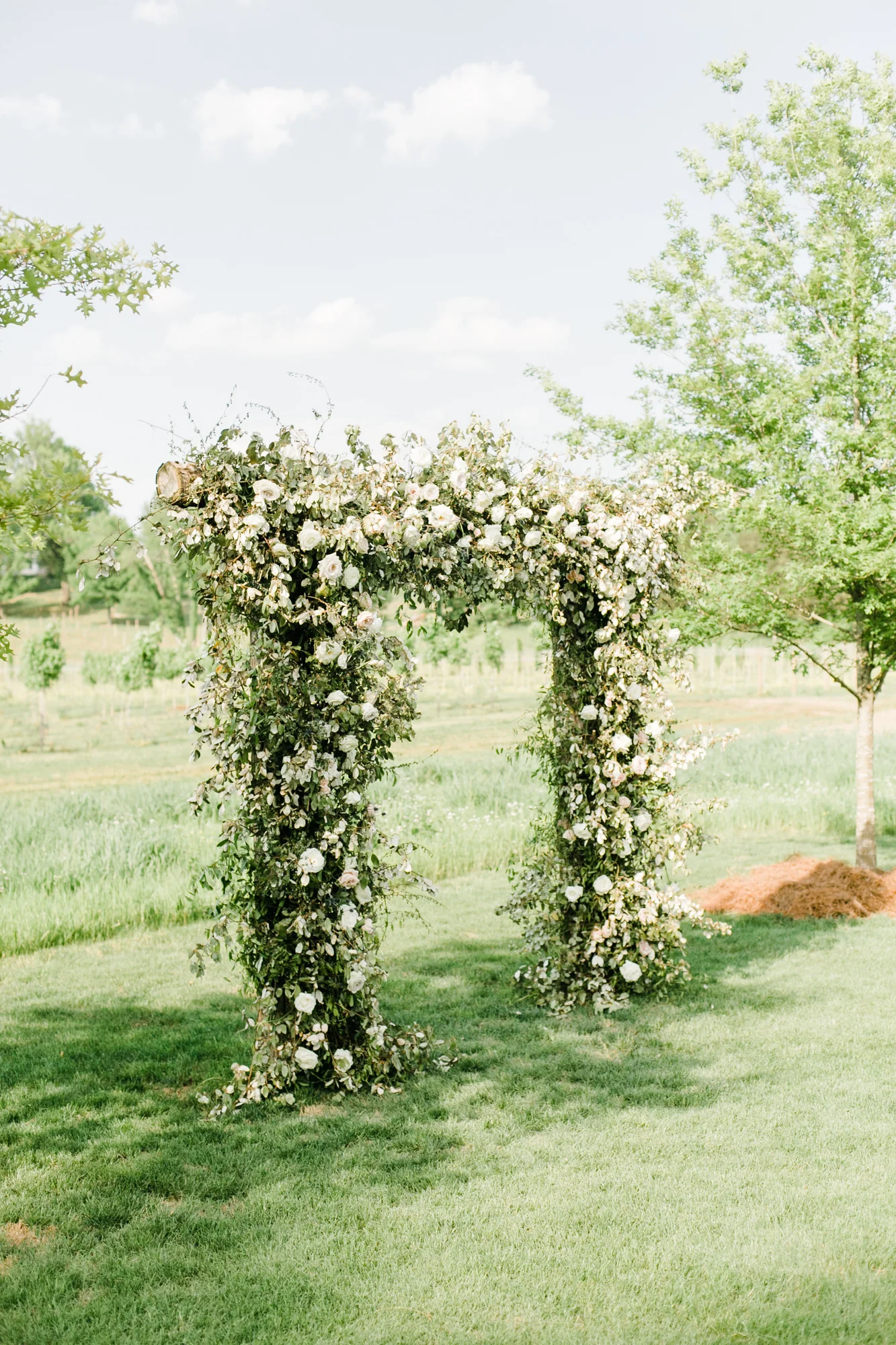 Natural, organic floral arch for the wedding ceremony backdrop // Nashville Wedding Florist