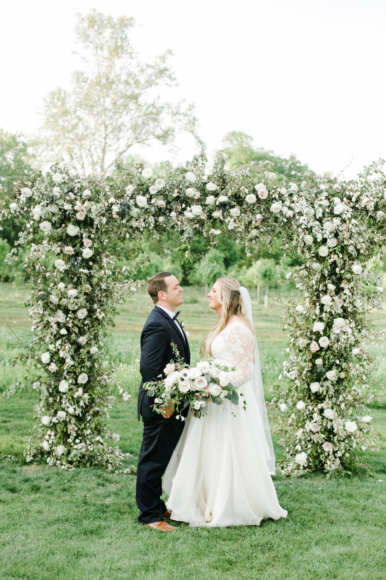 Natural, organic floral arch for the wedding ceremony backdrop // Nashville Wedding Floral Design