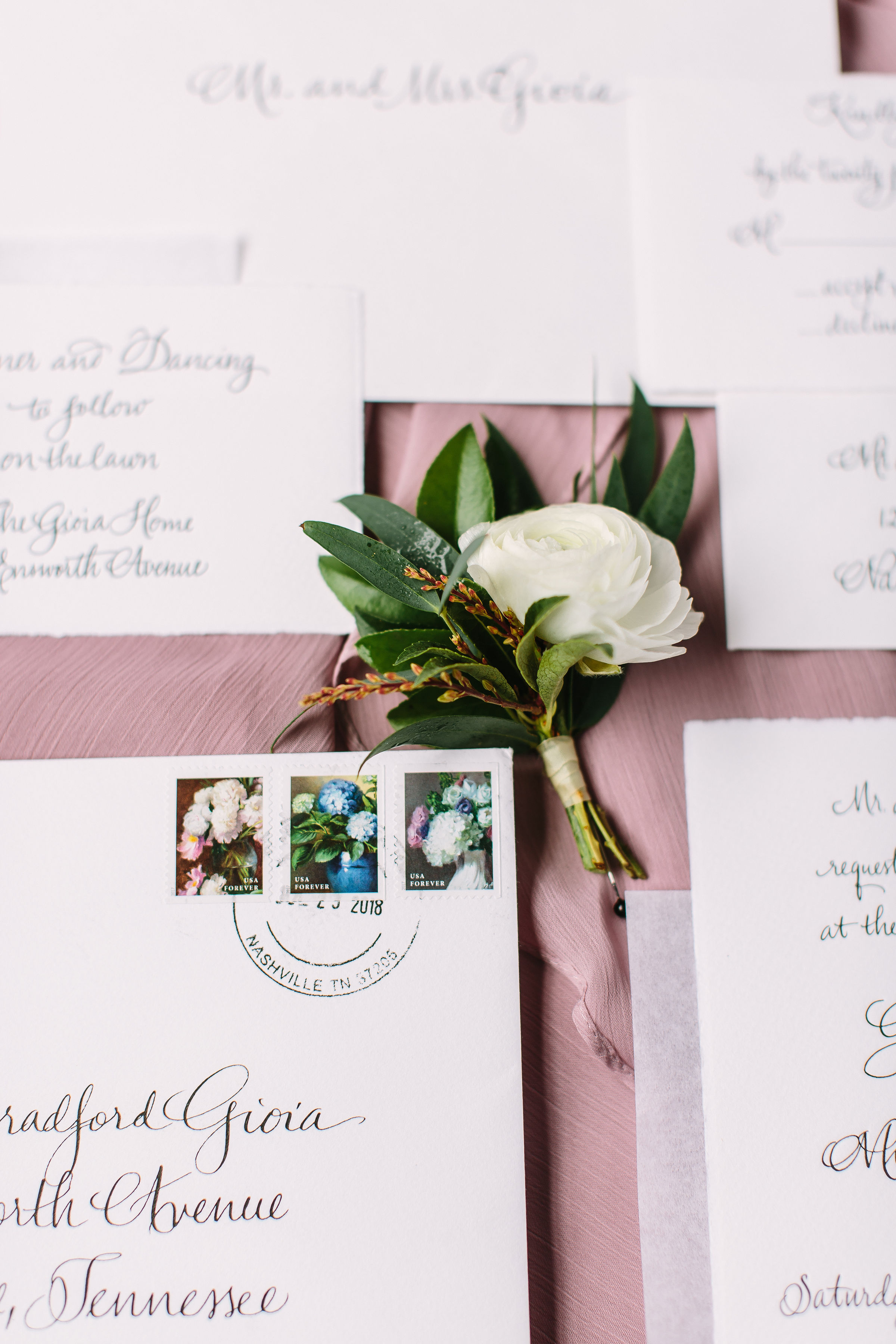 White ranunculus and greenery boutonniere // Nashville Wedding Floral Design