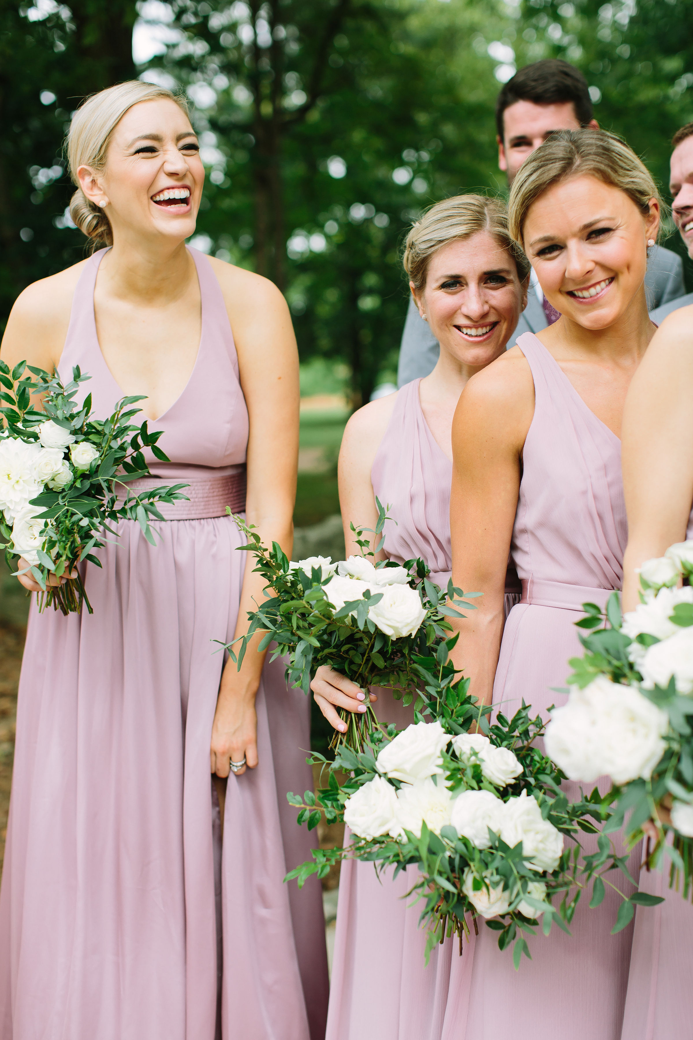 Lush, garden-inspired bridesmaid bouquets with garden roses, ranunculus, and dahlias // Nashville Wedding Florist