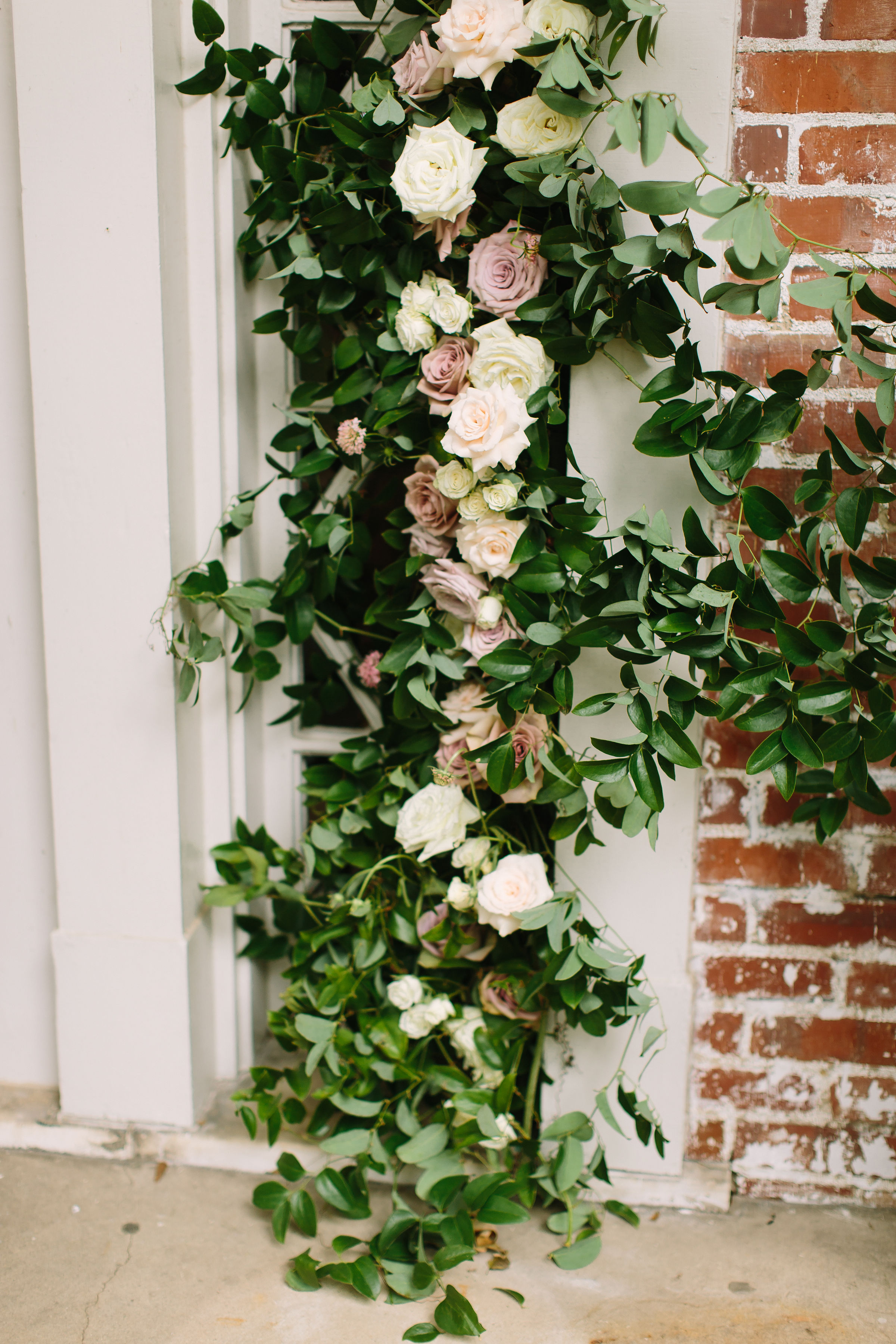 Garden-inspired floral installation on the front door // Nashville Backyard Wedding Floral Design