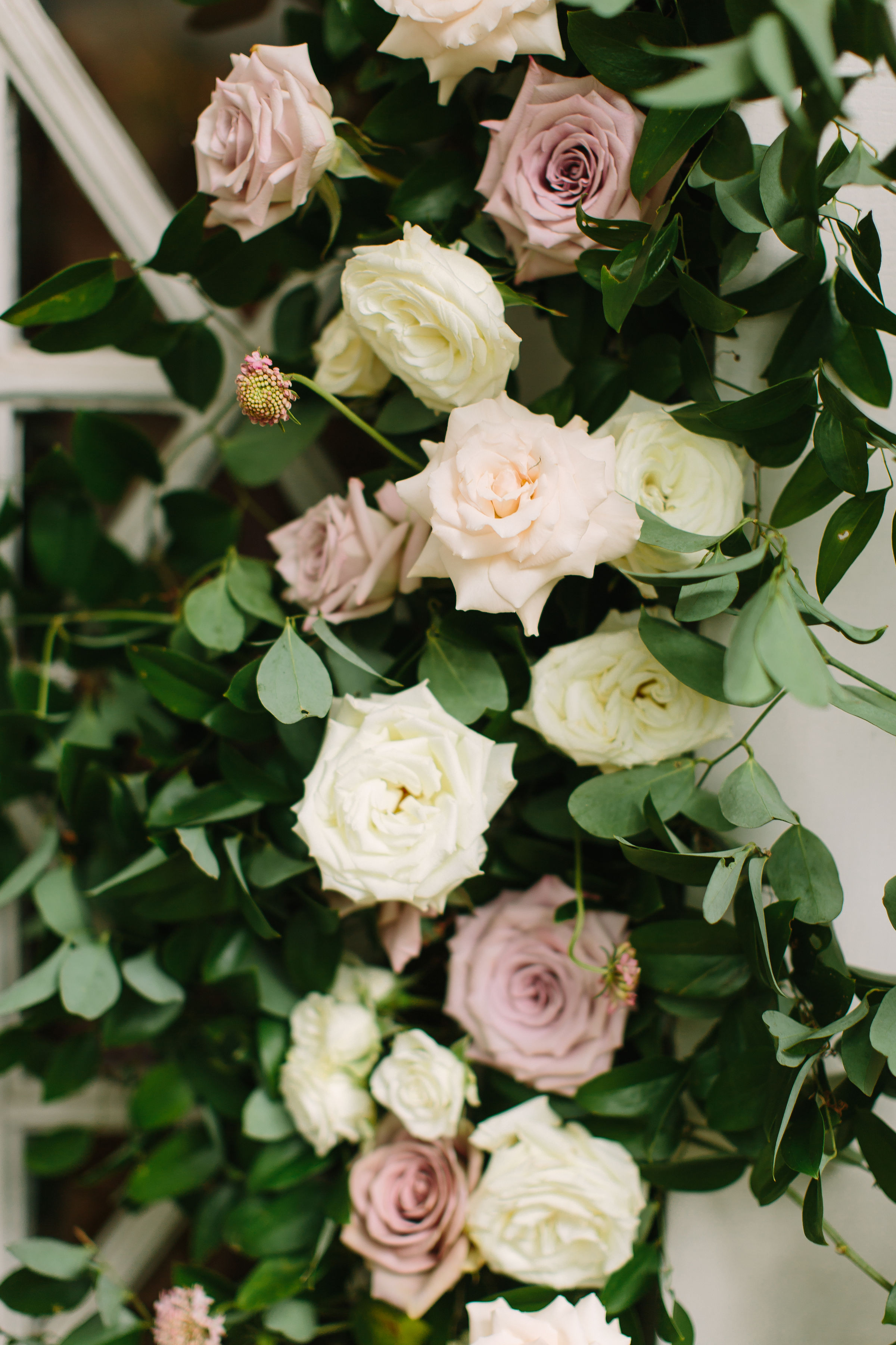 Dusty rose, blush, and ivory bridal bouquet with lush greenery // Nashville Wedding Florist