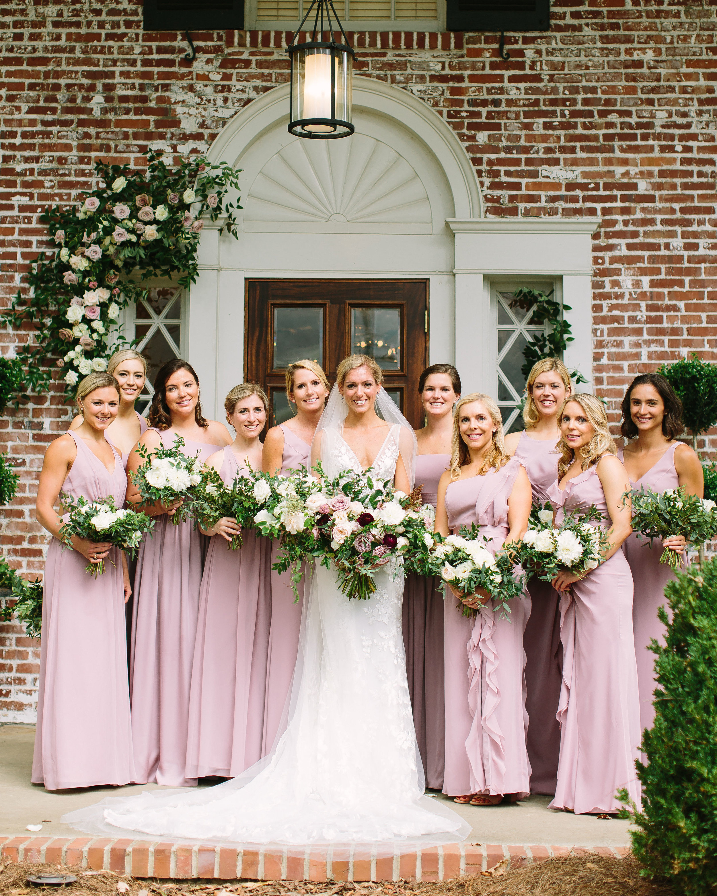 Dusty rose bridesmaid dresses with cream bouquet with lush greenery // Nashville Wedding Floral Design
