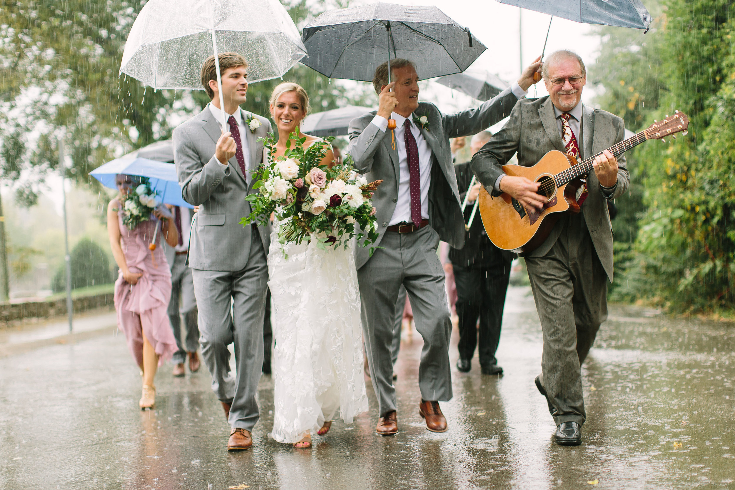 New Orleans style wedding parade in the rain // Nashville Wedding Florist