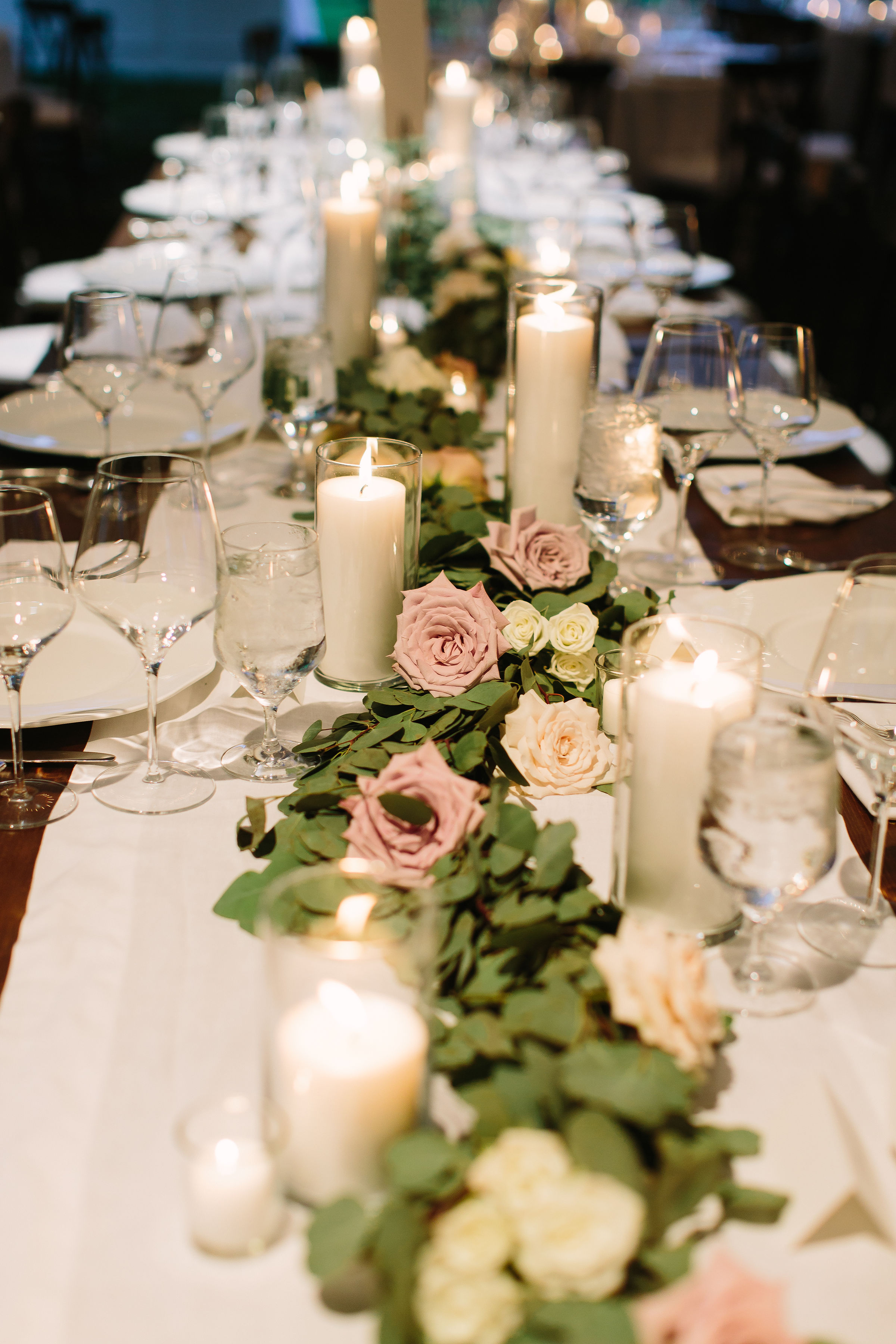 Head table greenery garland with floral accents of soft mauve and cream roses // Tennessee Floral Design