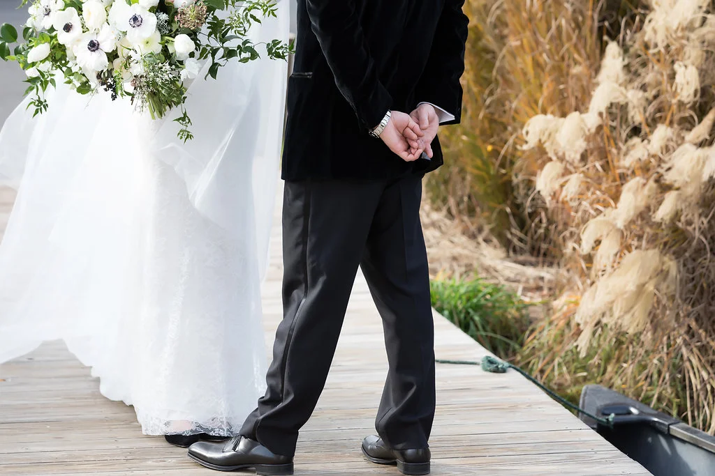 Oversized, asymmetrical bride’s bouquet with white flowers and natural, untamed greenery // Southeastern Wedding Floral Design at Blackberry Farm