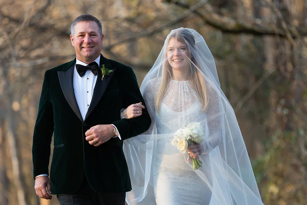 Dainty bridal bouquet with a cathedral veil // Tennessee Wedding Florist