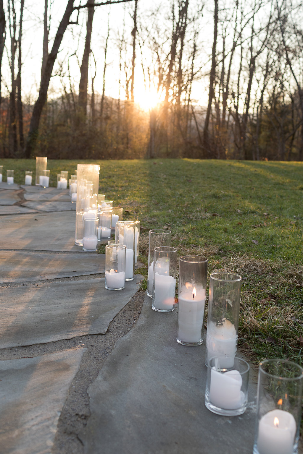 Candles lining the way to the wedding ceremony // Rosemary & Finch Floral Design