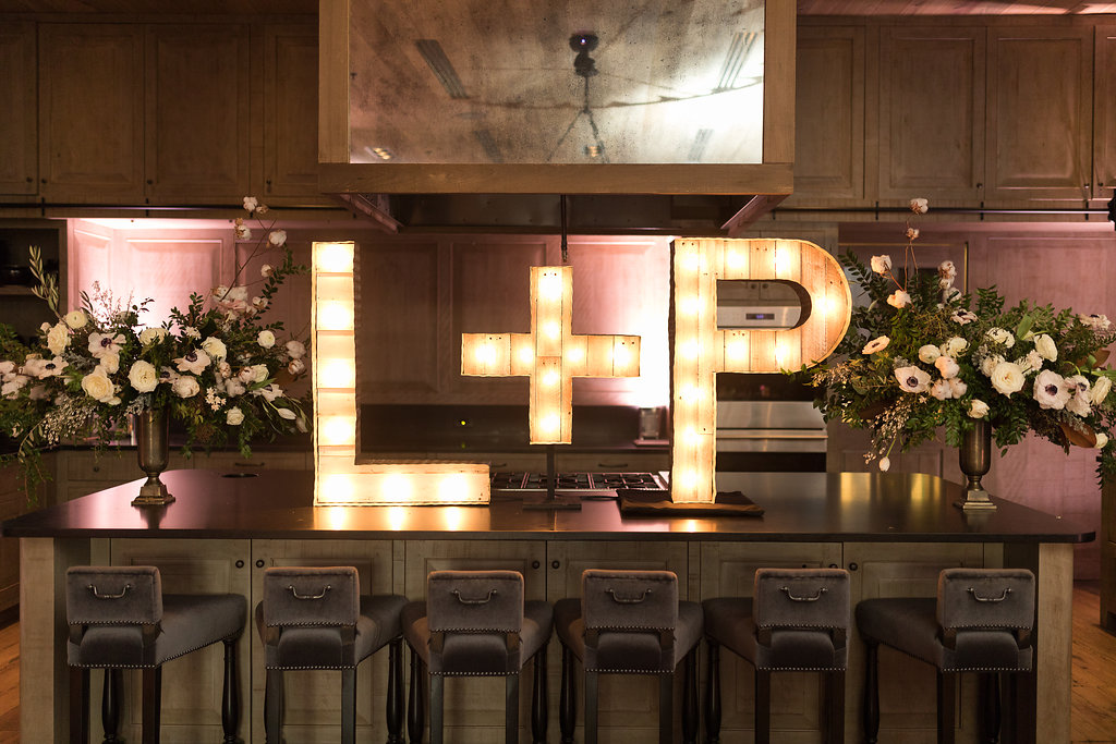 Natural, garden inspired wedding flowers with white garden roses, anemones, tulips, ranunculus, and trailing greenery // Nashville, TN Wedding Flowers // Rosemary & Finch Floral Design