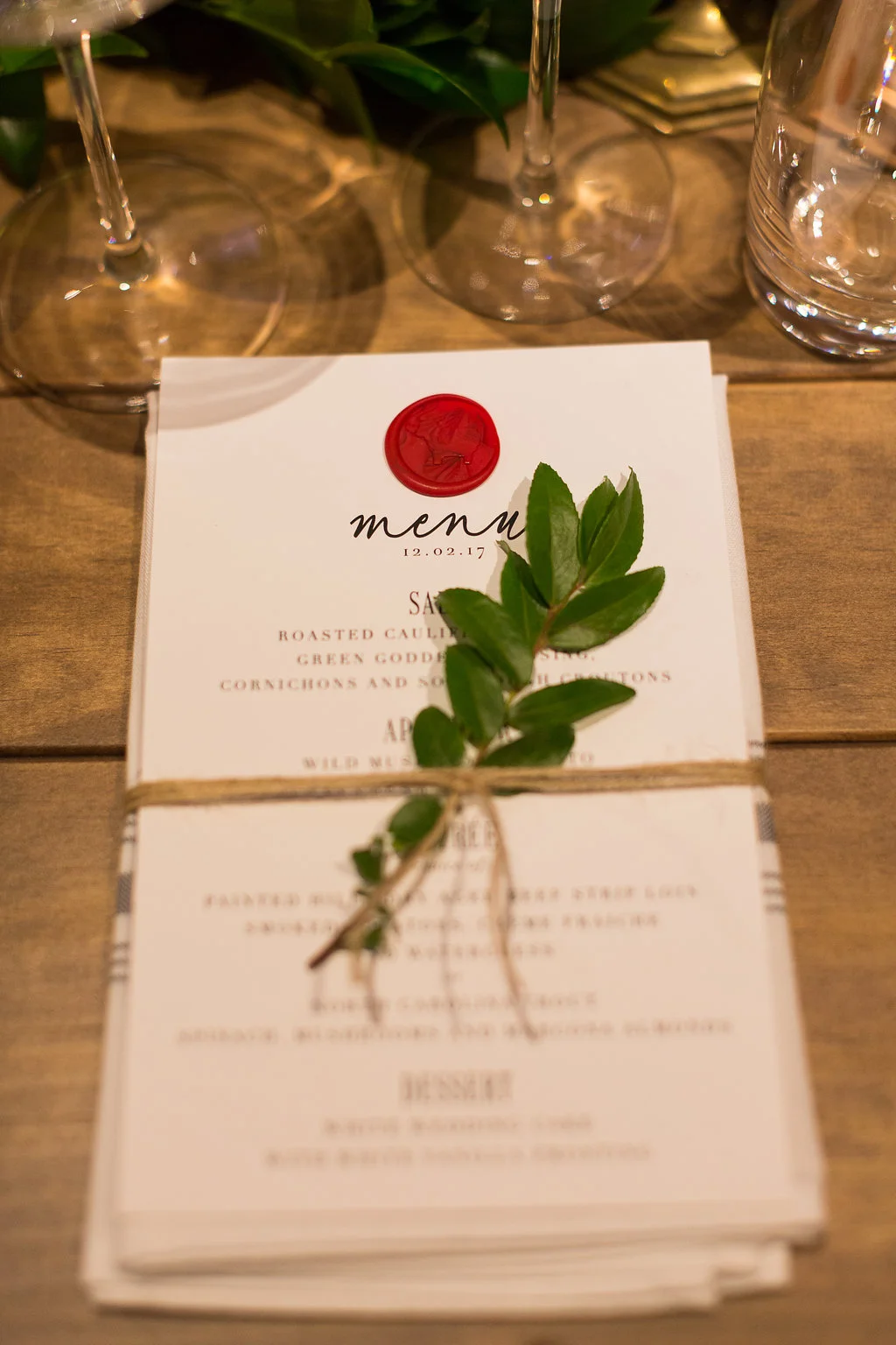 Place setting greenery sprig // Nashville Wedding Florist