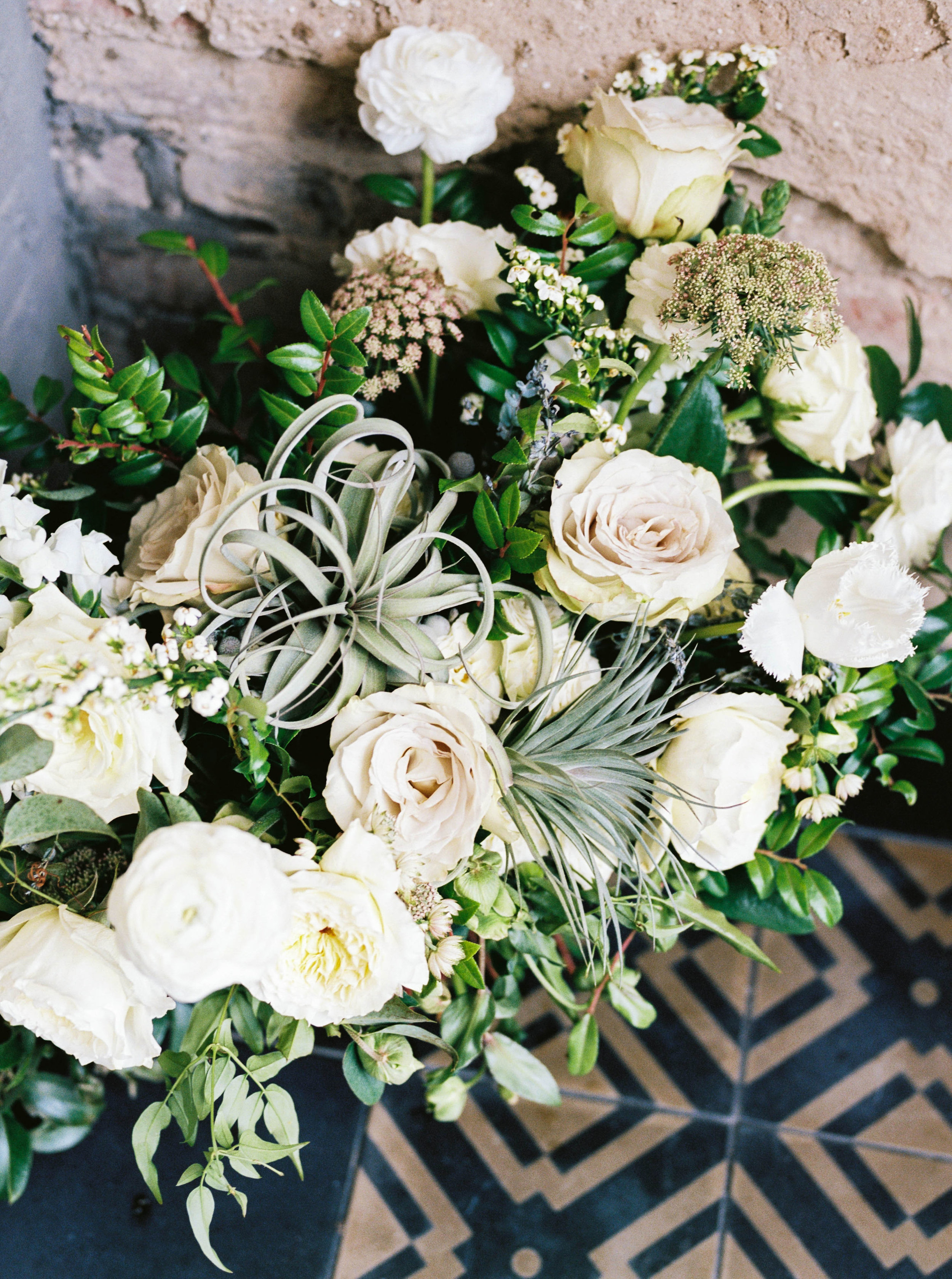 Organic bridal bouquet with garden roses, ranunculus, air plants, and greenery // Nashville, TN Wedding Florist