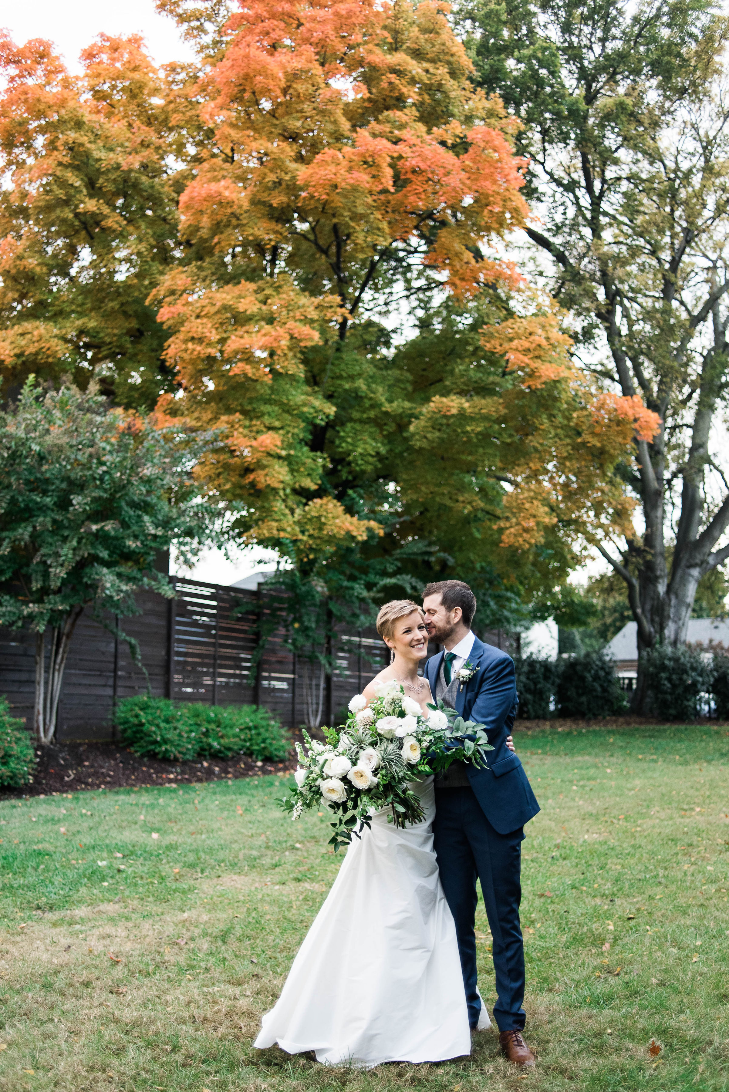 Organic bridal bouquet with garden roses, ranunculus, air plants, and greenery // Nashville, TN Wedding Florist