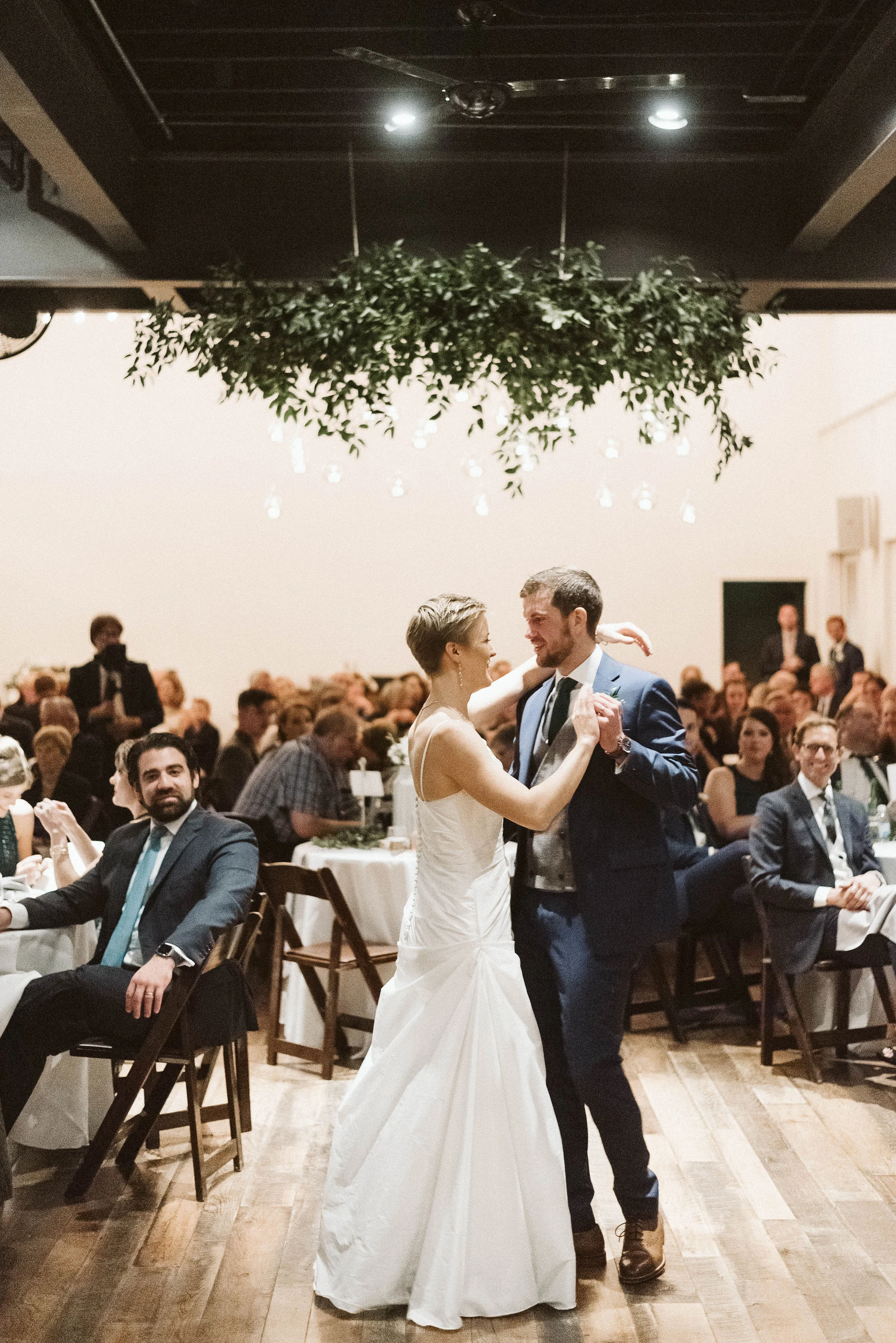 Hanging candle installation with untamed greenery // Tennessee Wedding Floral Design