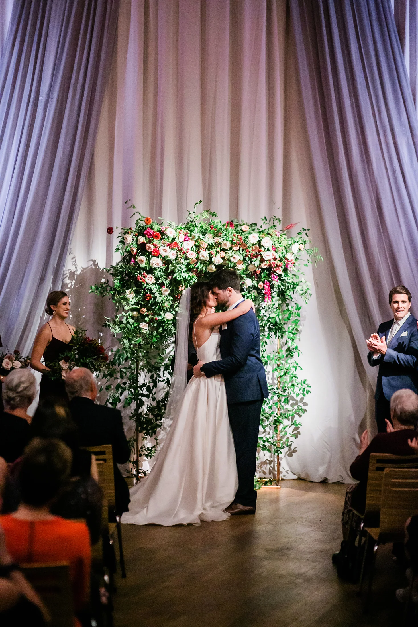 Flower wall for the wedding ceremony backdrop with lush greenery and burgundy and blush florals // Nashville Wedding Florist