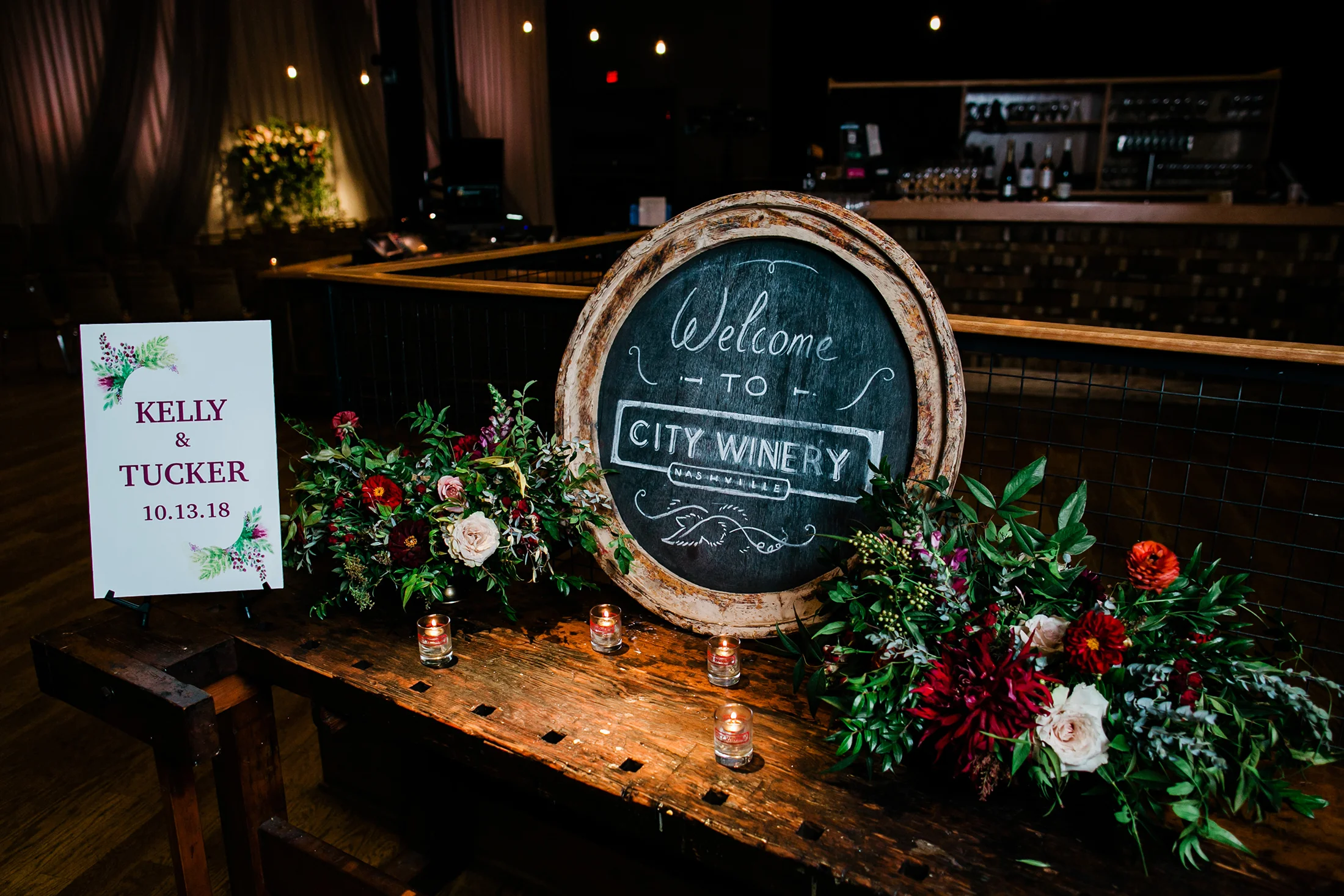 Low floral centerpieces with burgundy dahlias and blush garden roses // Nashville Wedding Floral Design