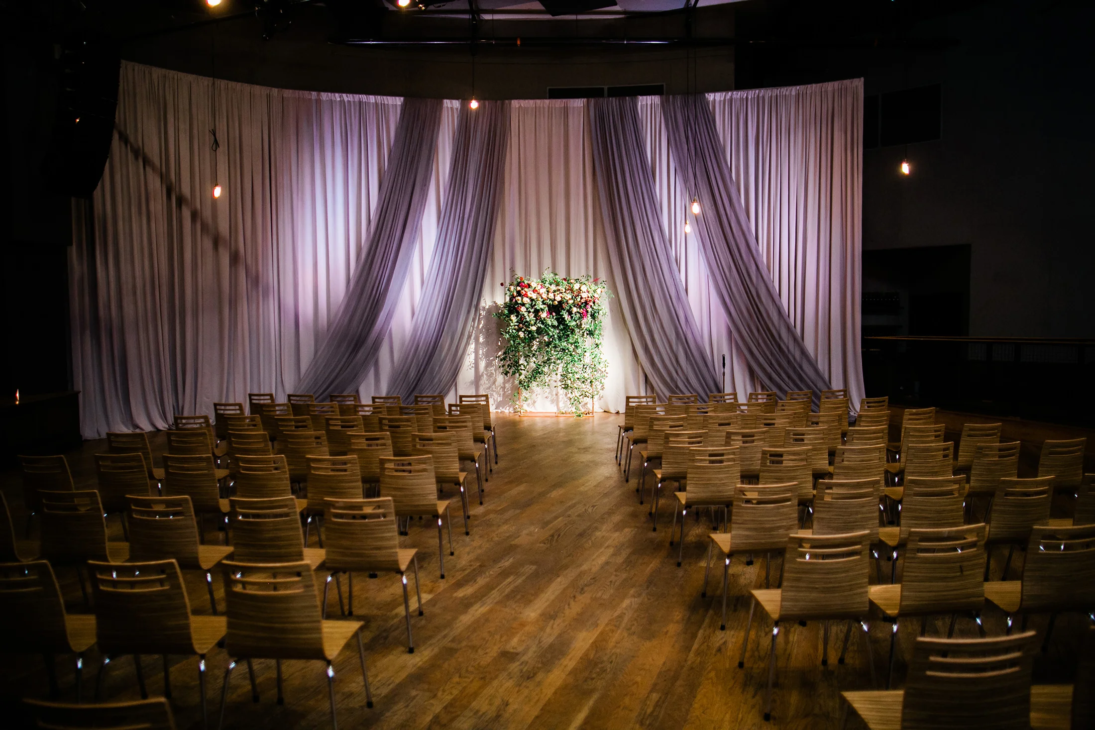 Flower wall for the wedding ceremony backdrop with lush greenery and burgundy and blush florals // Nashville Wedding Florist