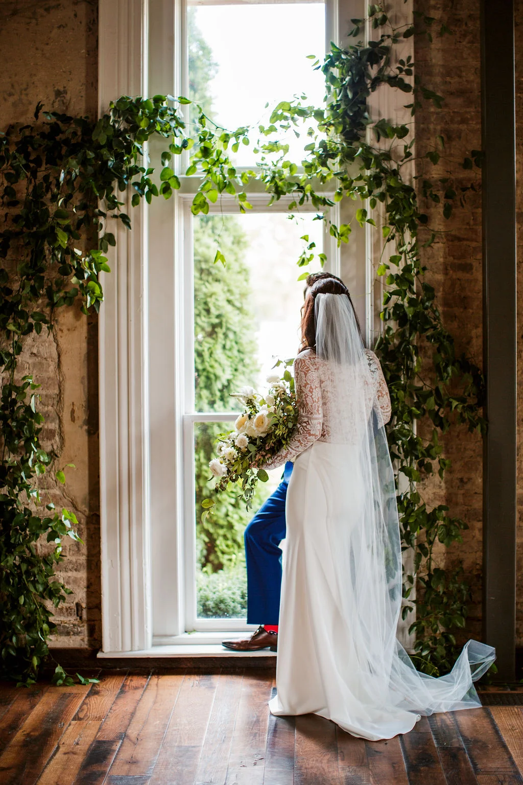 Vine-like greenery arch installation for the ceremony backdrop // Southern US Wedding Floral Designer
