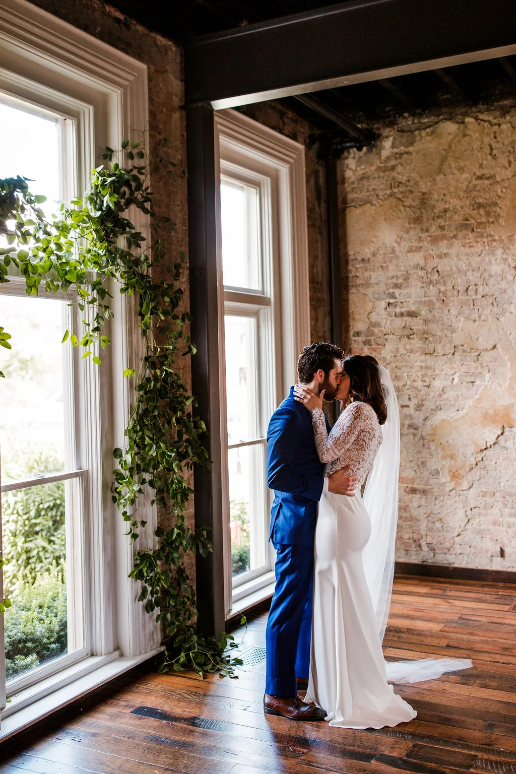 Vine-like greenery arch installation for the ceremony backdrop // Southern US Wedding Floral Designer