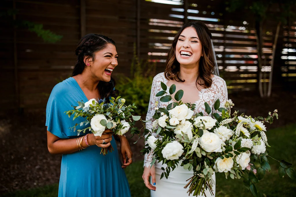 All white and greenery bouquets for bridesmaids in blue dress // Nashville Wedding Flowers