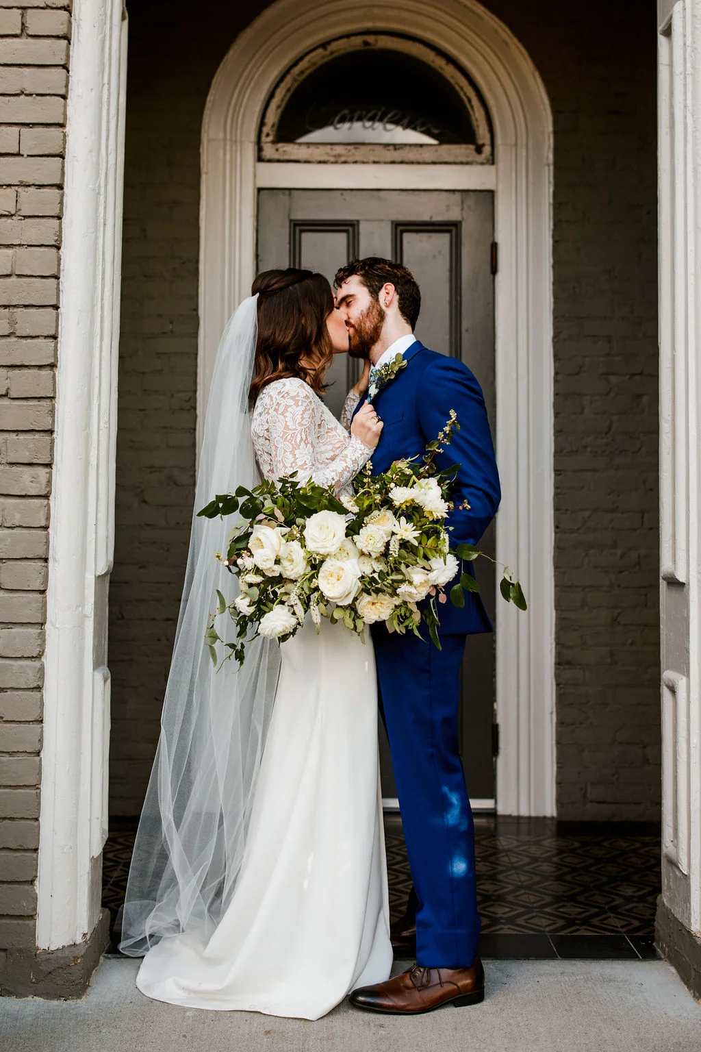 Organic, untamed bridal bouquet with all white flowers and natural greenery // Nashville Wedding Florist