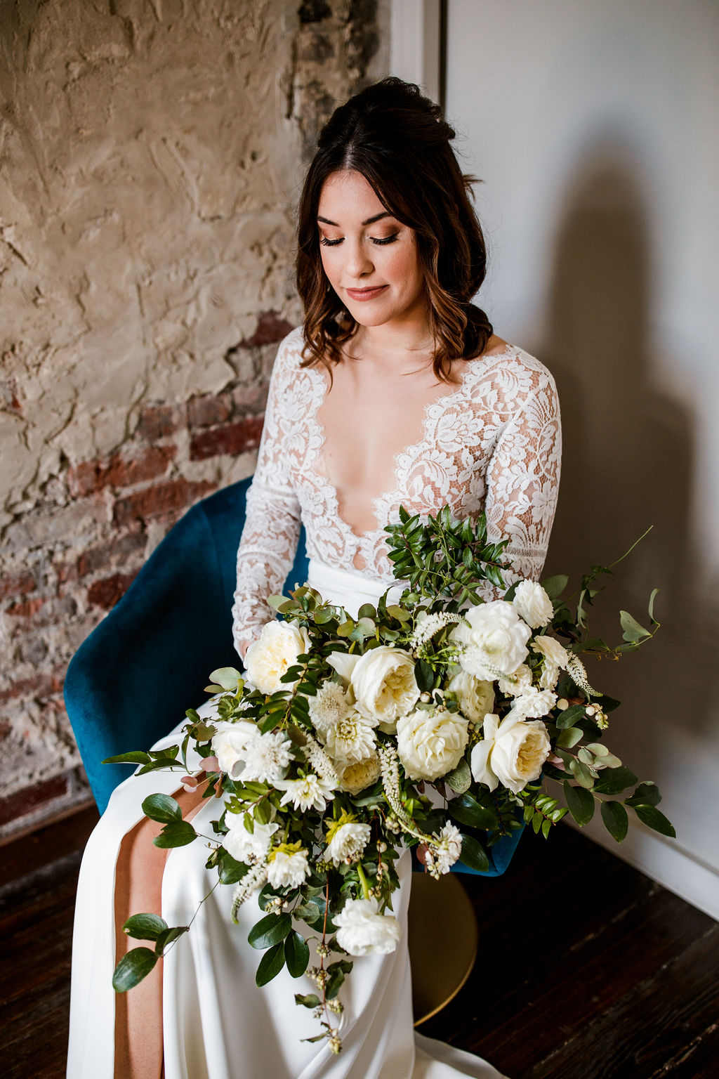 Organic, untamed bridal bouquet with all white flowers and natural greenery // Nashville Wedding Florist