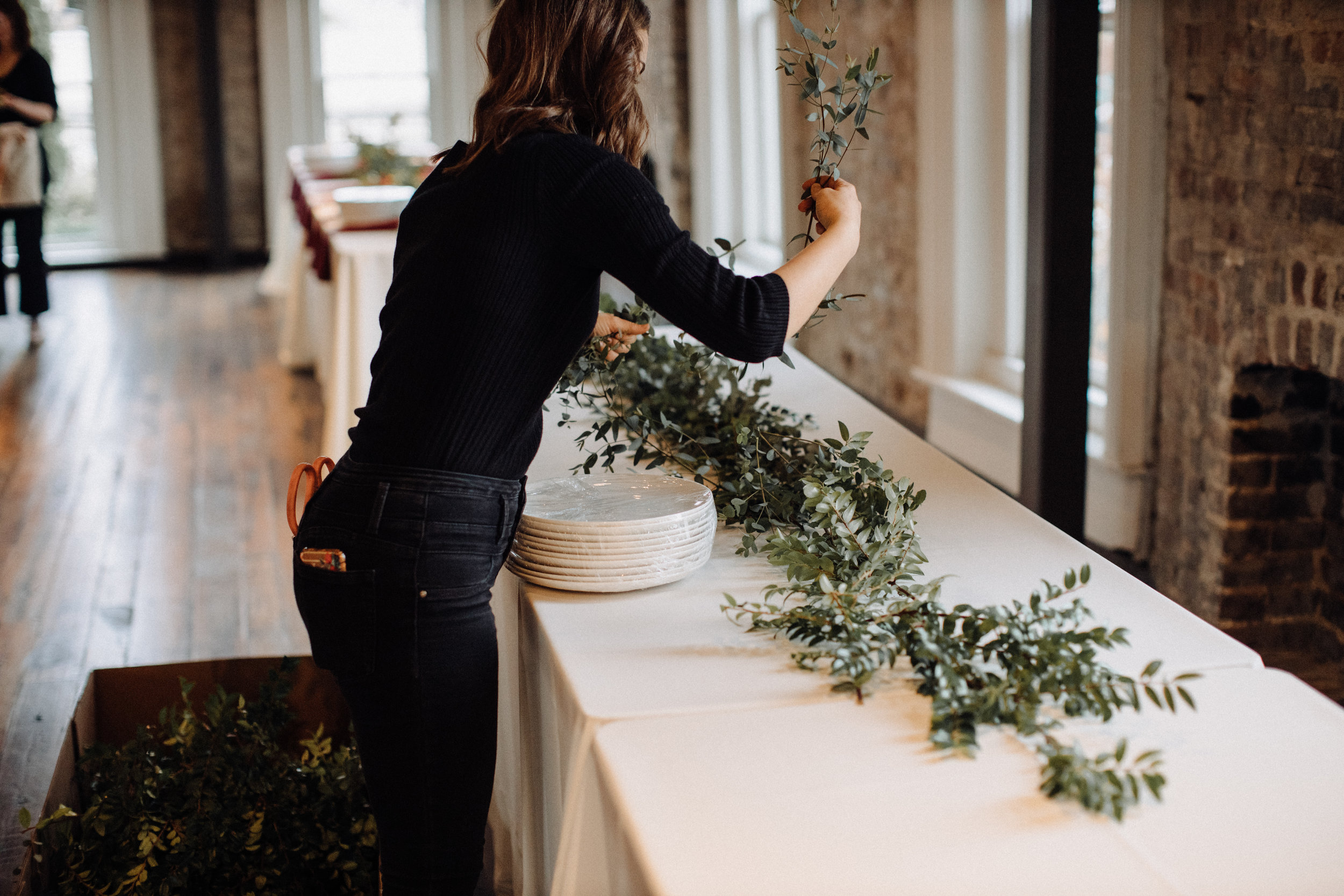 Garland table runner of eucalyptus and natural greenery. Garden-inspired wedding florals at the Cordelle, Nashville.
