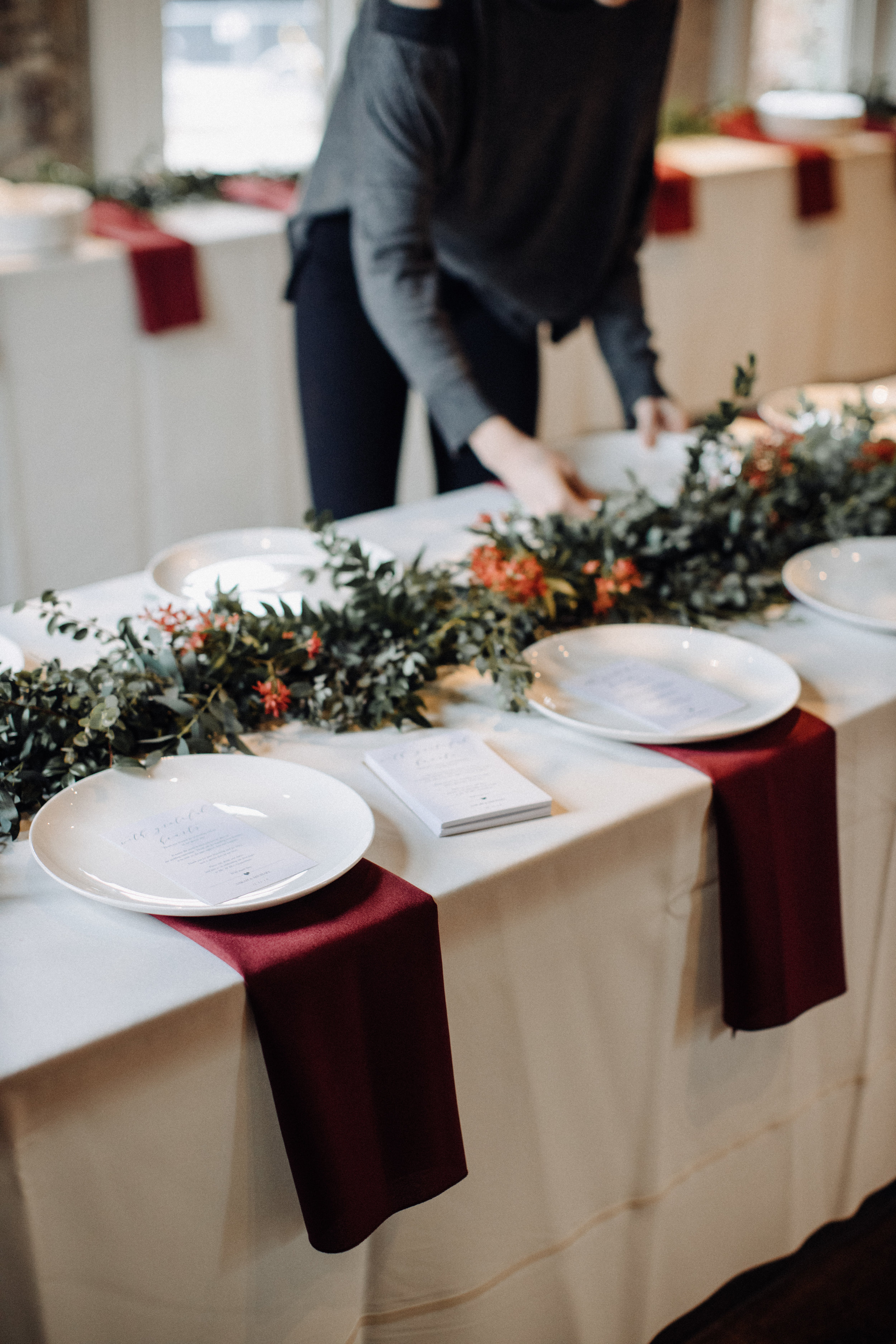 Garland table runner of eucalyptus and natural greenery. Garden-inspired wedding florals at the Cordelle, Nashville.
