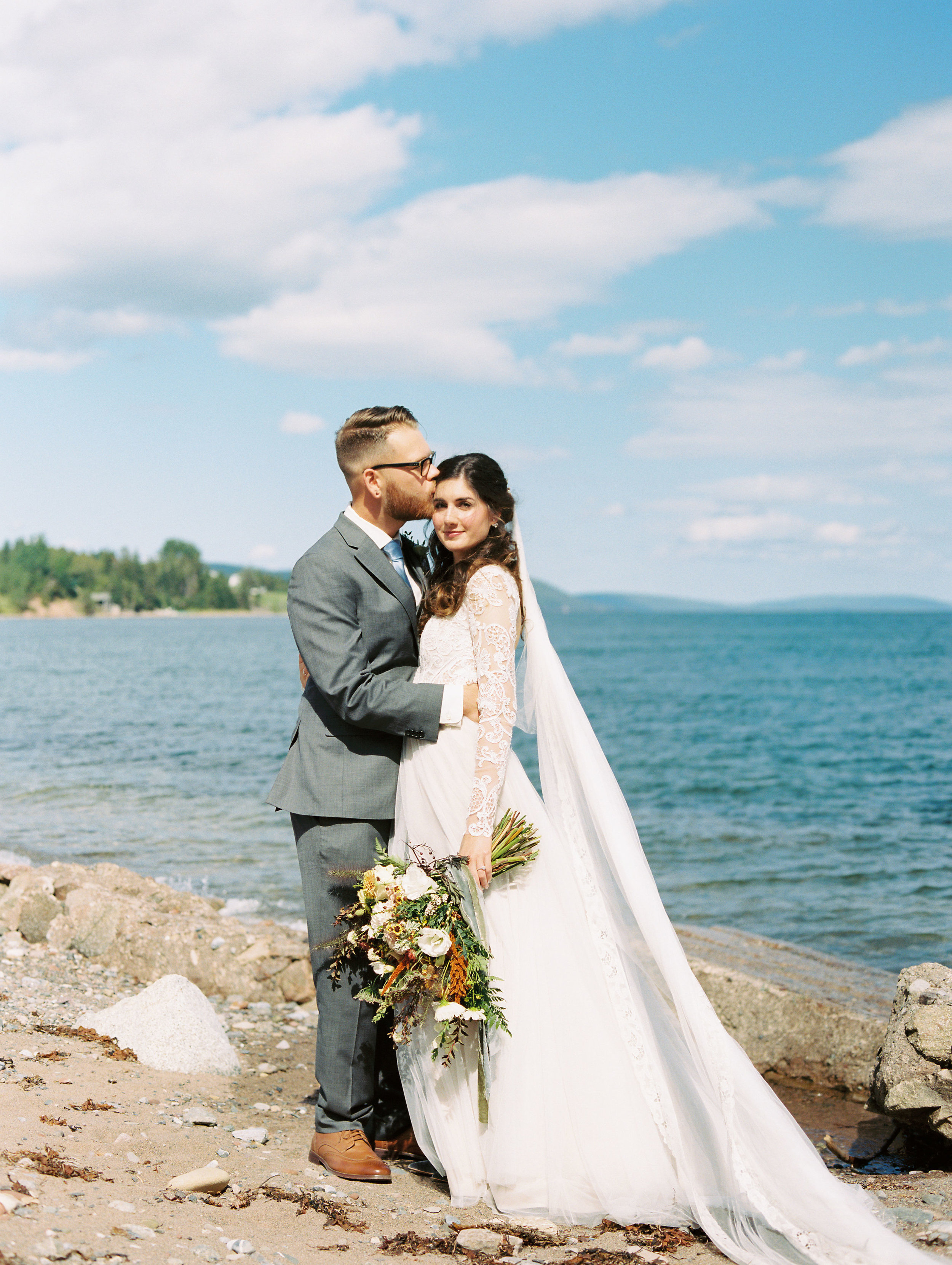 Natural, untamed bridal bouquet in neutral colors with sage green velvet ribbon. Nova Scotia Wedding Floral Design