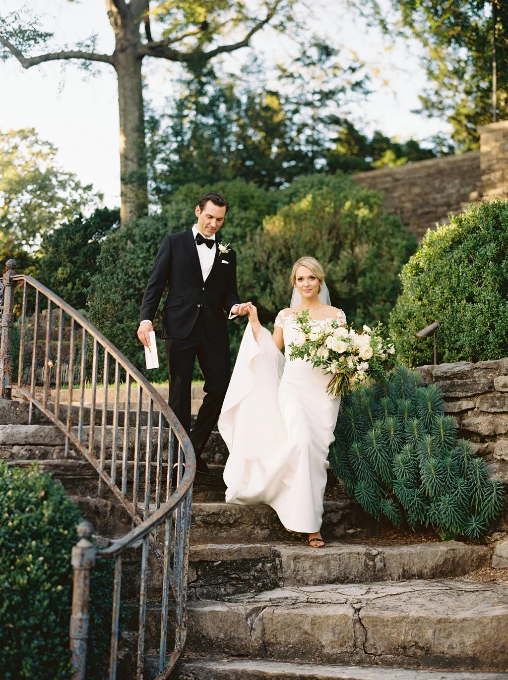 Botanic Garden Wedding with all white florals with lush greenery. Nashville Floral Designer.