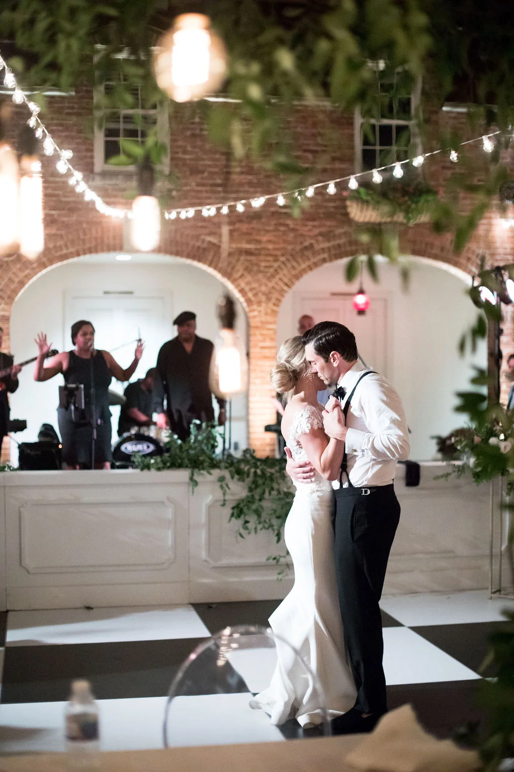 Garden Wedding with all white florals with lush greenery. Nashville Floral Designer.