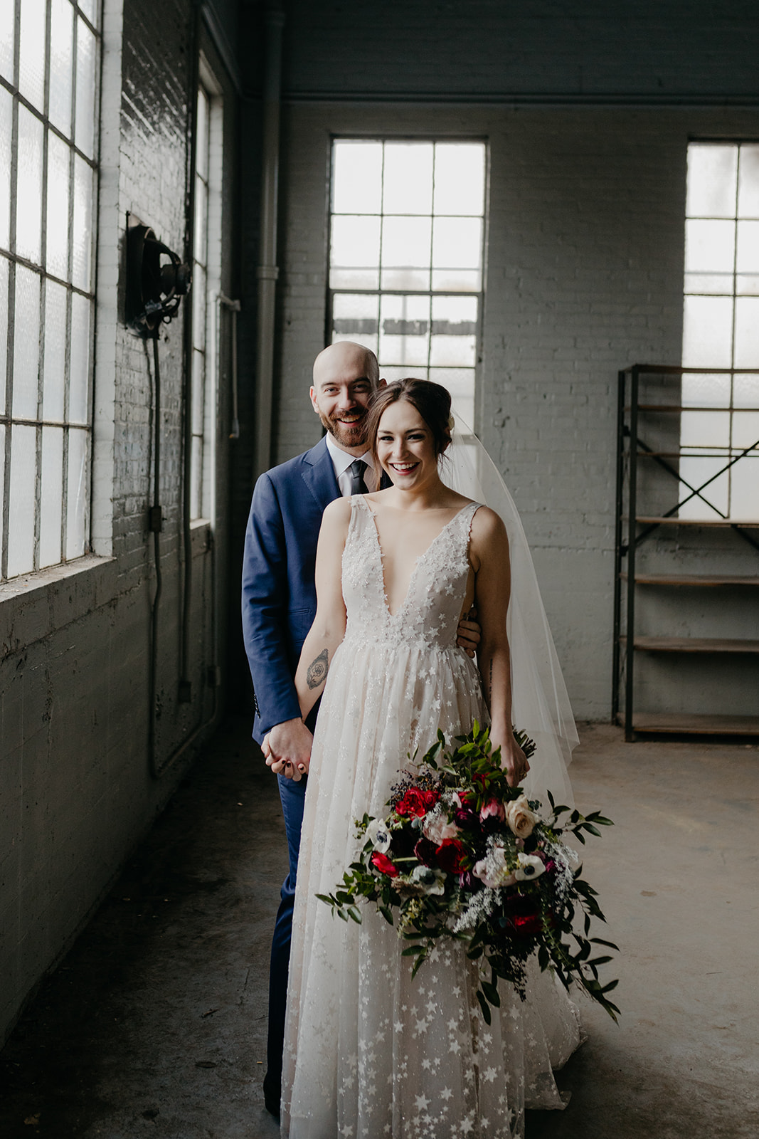 Starry night inspired wedding! Jewel tone bride's bouquet and star covered wedding dress.