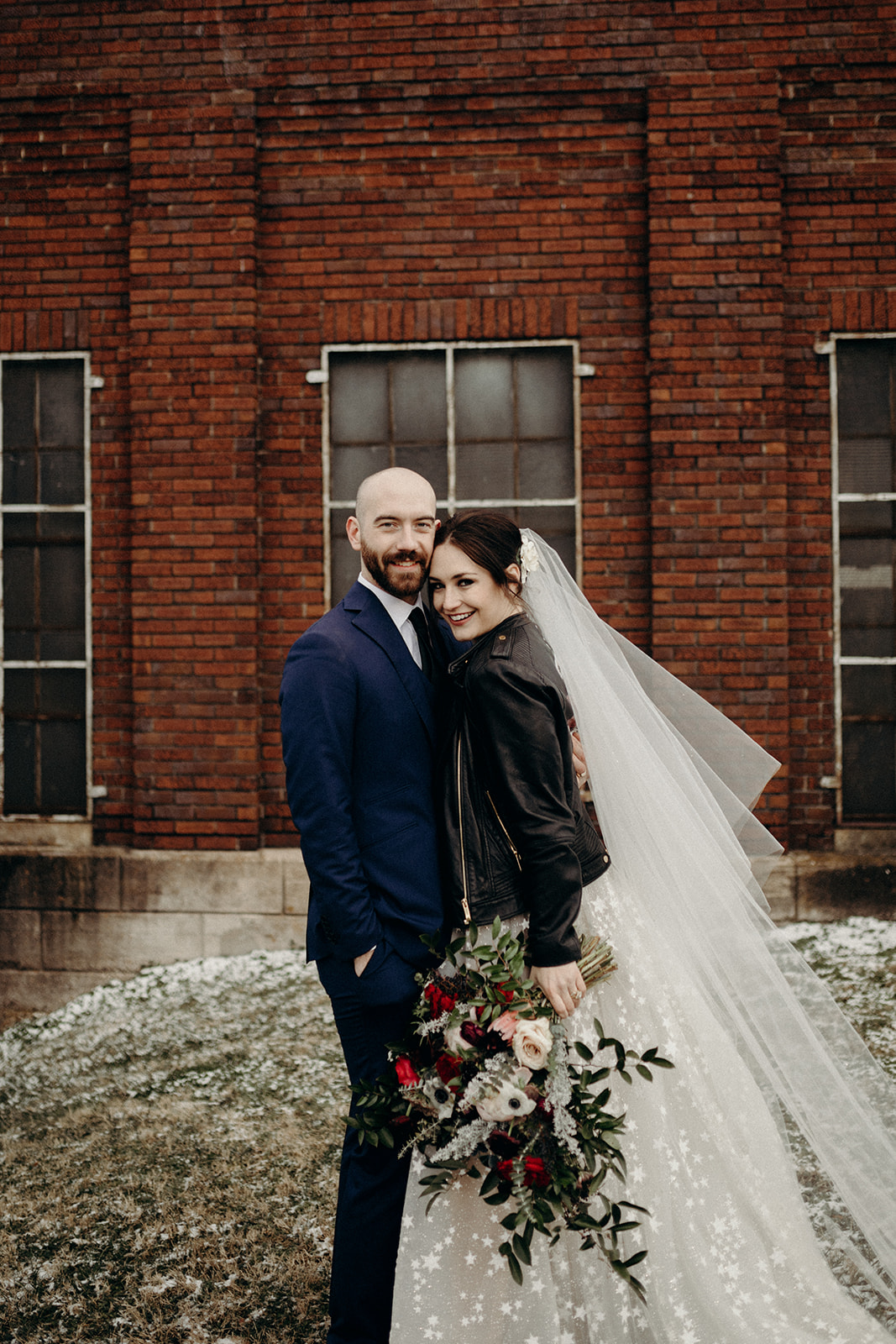 Next morning bride and groom photos! Lush bridal bouquet with peonies, garden roses, and anemones. Nashville, TN luxury wedding floral design with the bride in a leather jacket!!