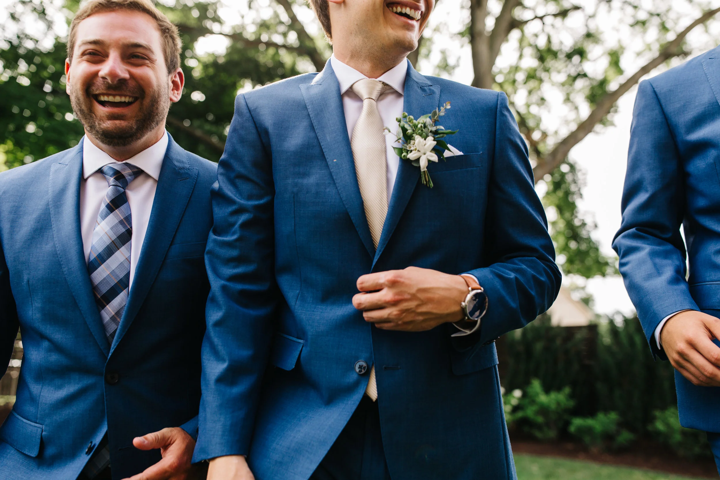 Blue bridal party style with all white, greenery heavy, organic floral design style. Southern Wedding Florist.