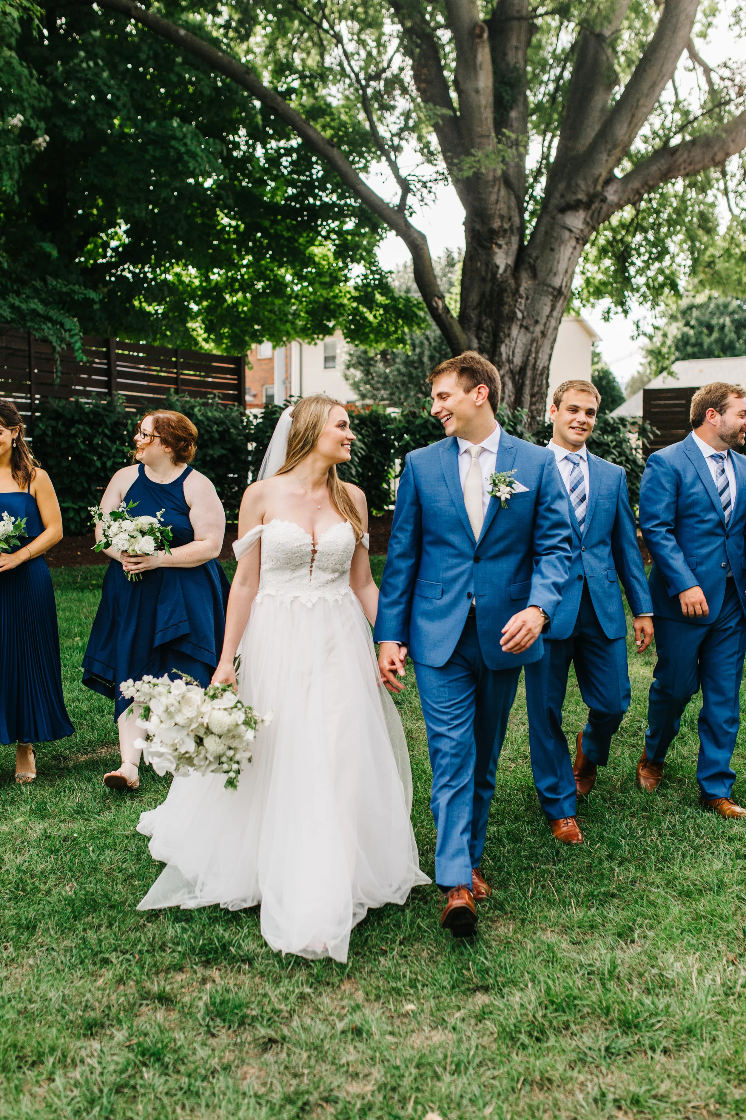 White stephanotis boutonniere with greenery and texture for the groom. Nashville Wedding Flowers.