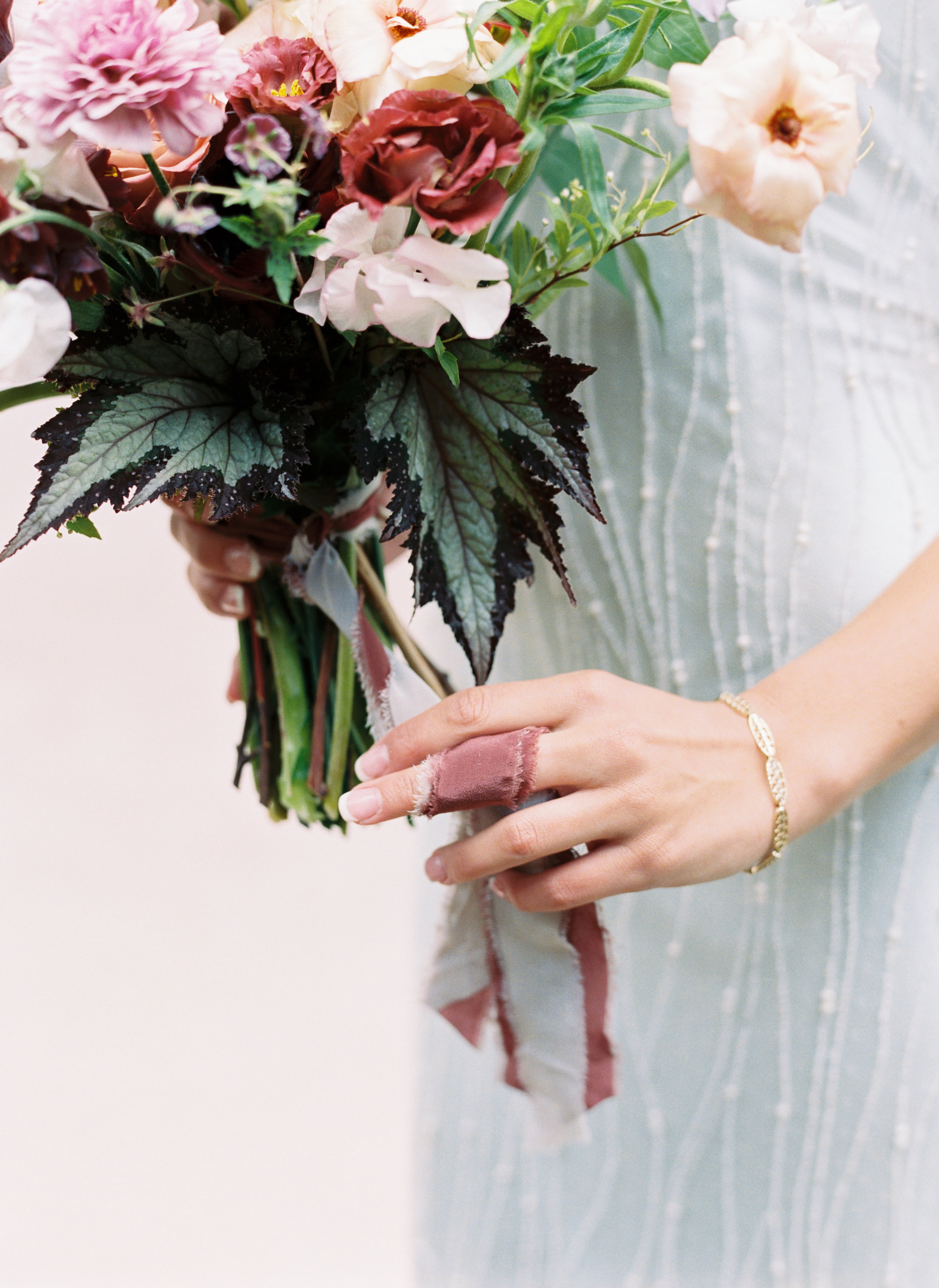Pale blue wedding dress with lush, organic bridal bouquet. Nashville Wedding Florist.