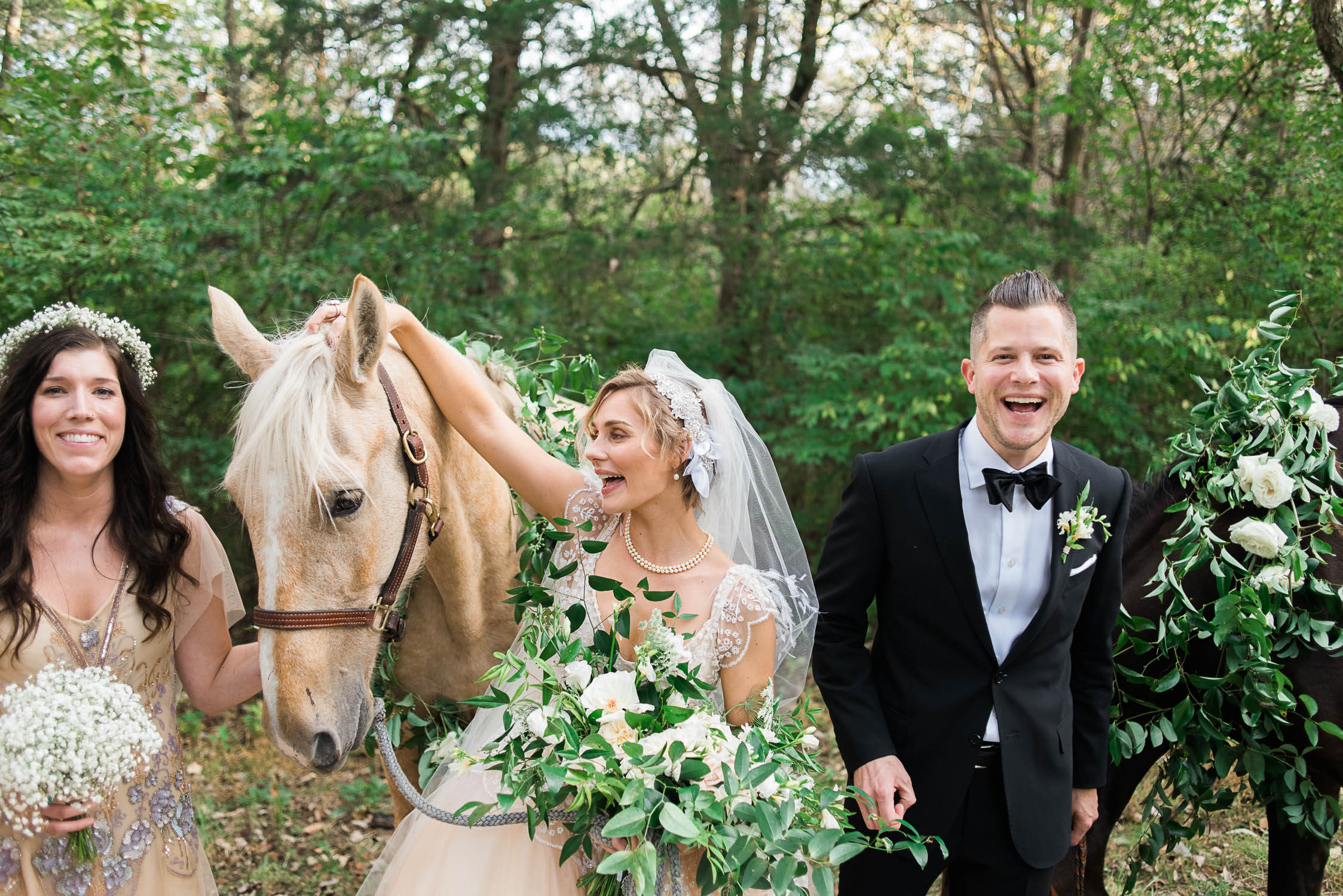 Garden-inspired bridal bouquet with garden roses, ranunculus, and lush, trailing greenery. Nashville Wedding Floral Design.