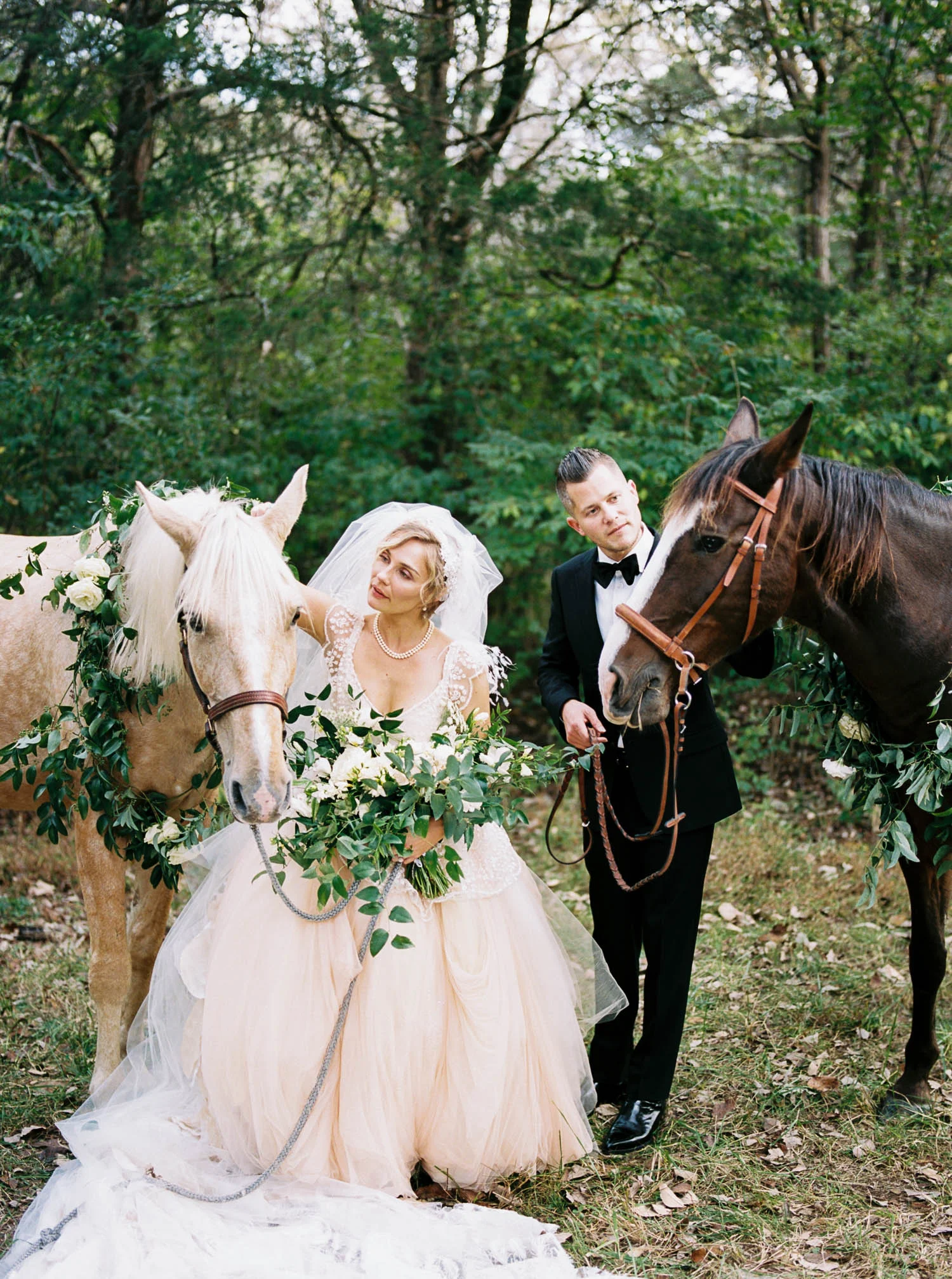 Lush bridal bouquet and floral garland for horse. Nashville Wedding Florist.
