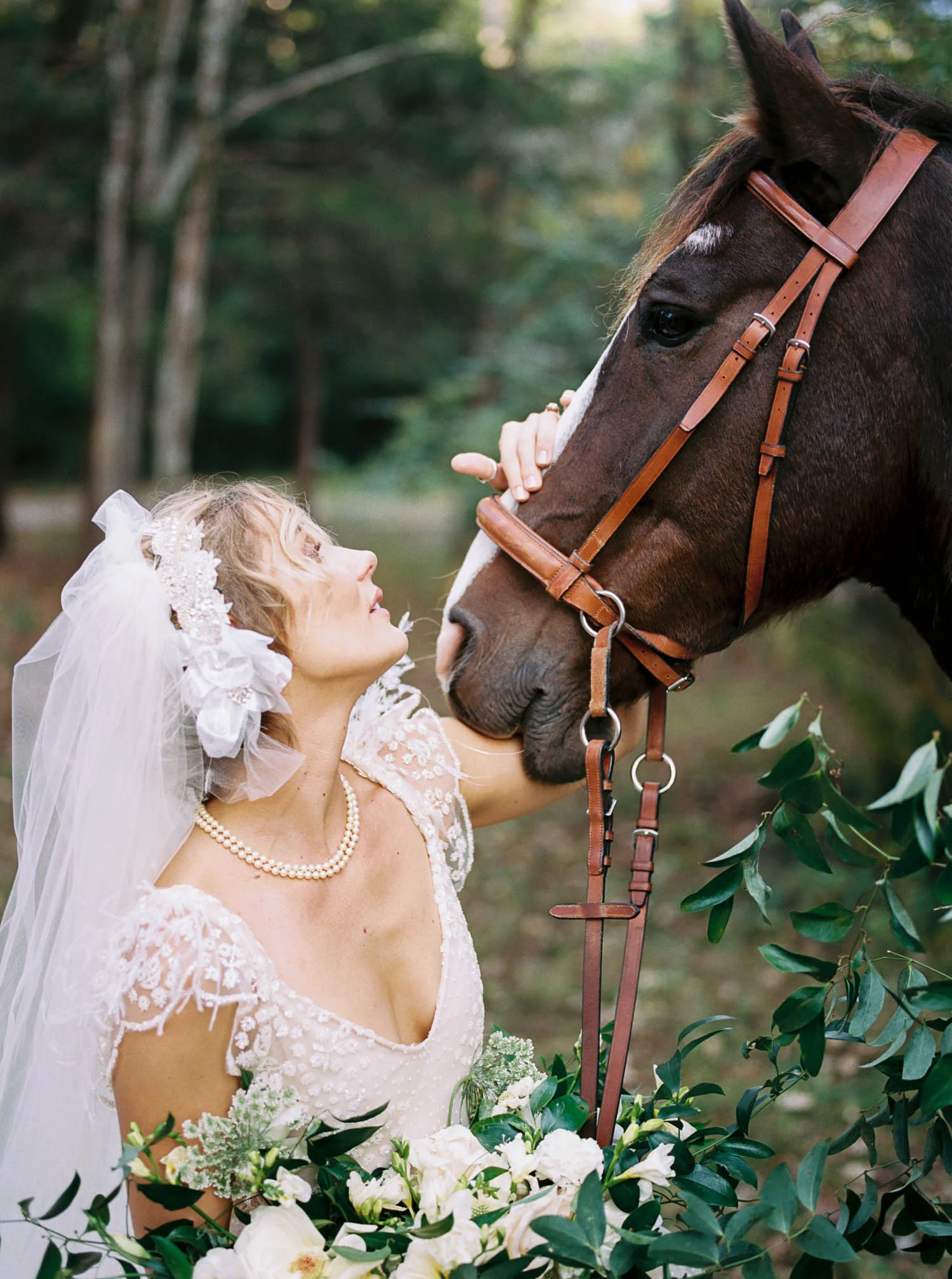 Lush bridal bouquet and floral garland for horse. Nashville Wedding Florist.