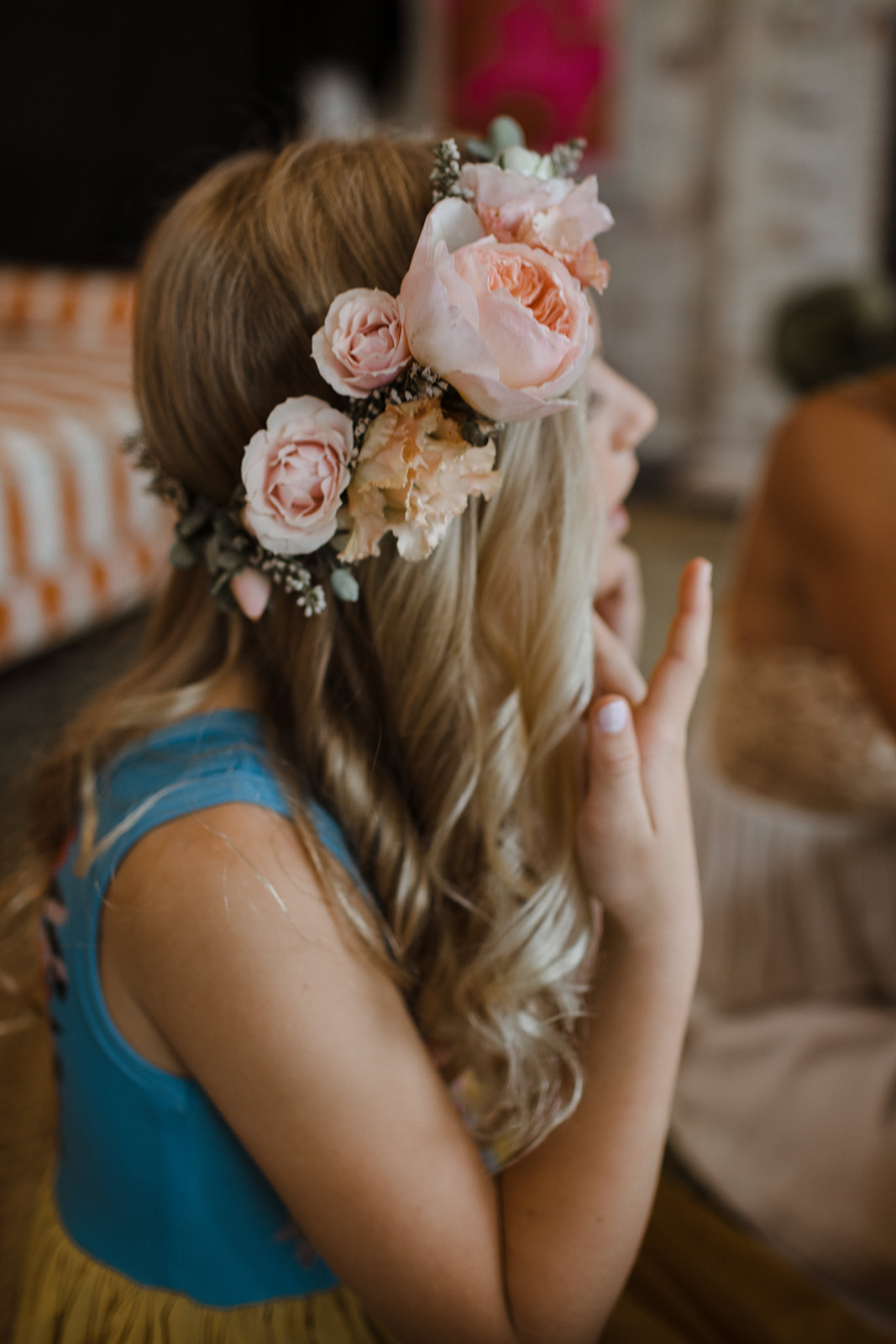 Oversized flower girl crown with peach garden roses and ranunculus.