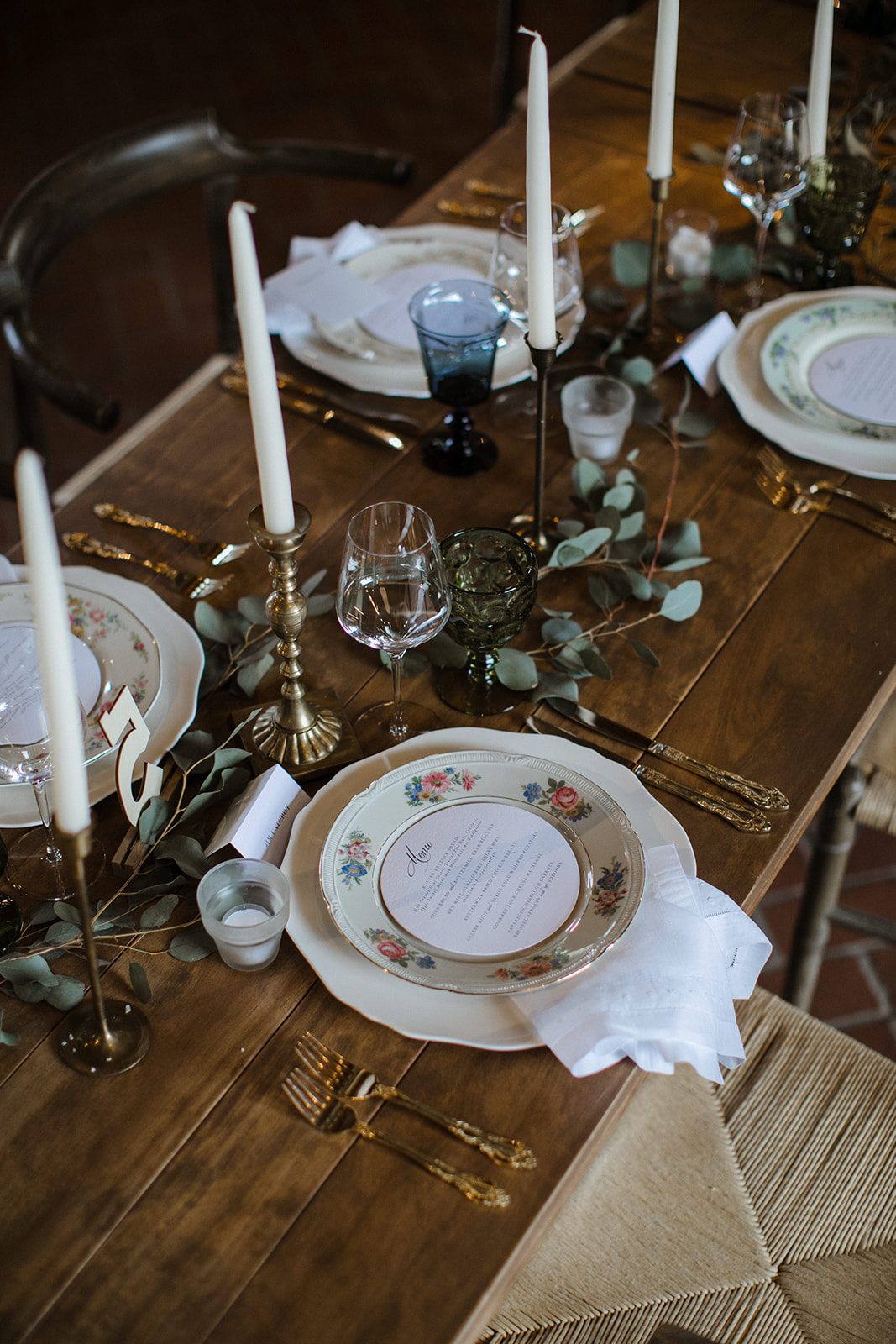 Light eucalyptus garland with brass candlesticks. Nashville Wedding Flowers.