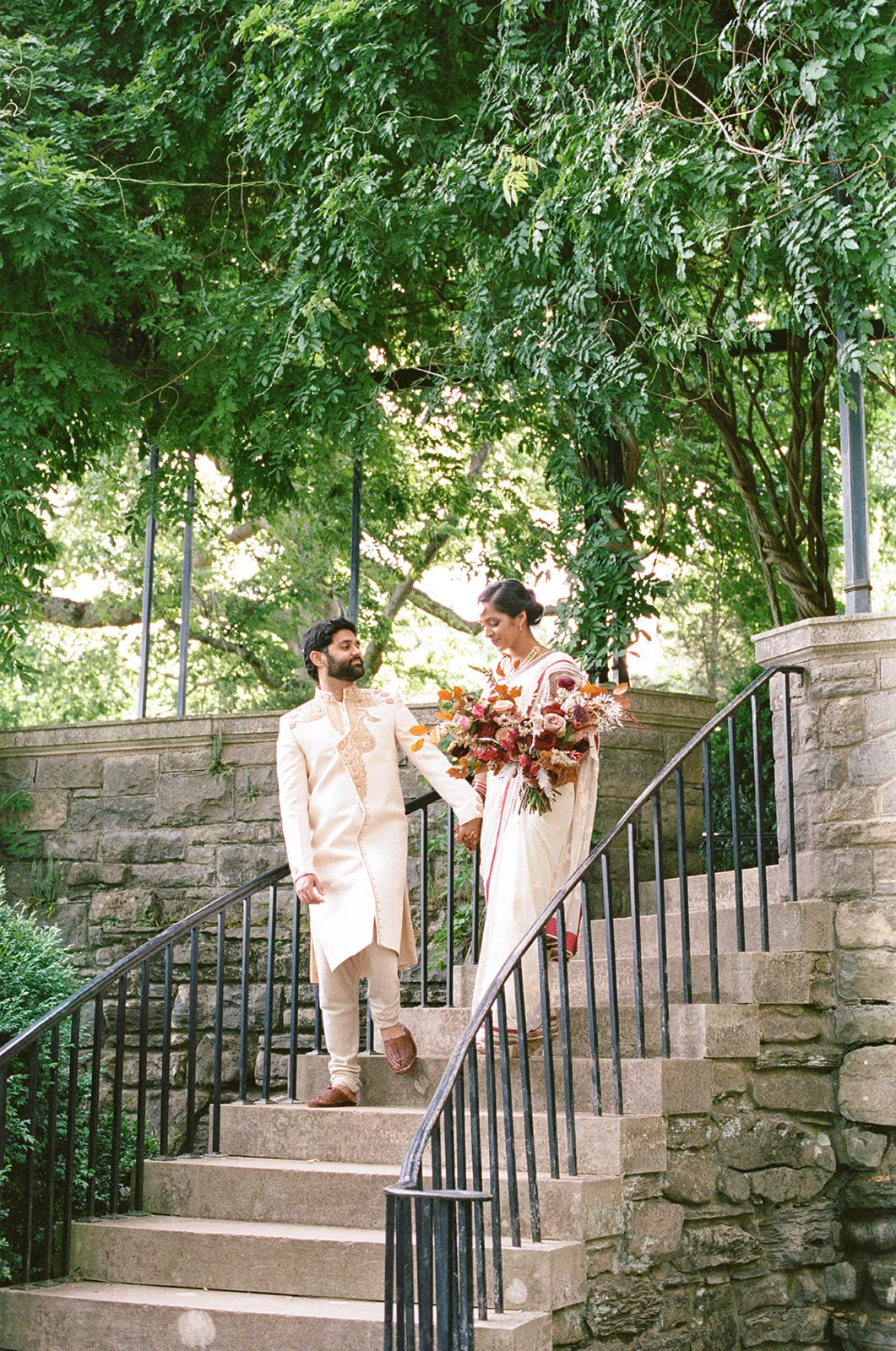 Copper, mauve, and marsala Indian bridal bouquet with white ferns, garden roses, sweet peas, and tulips. Nashville Wedding Floral Design.