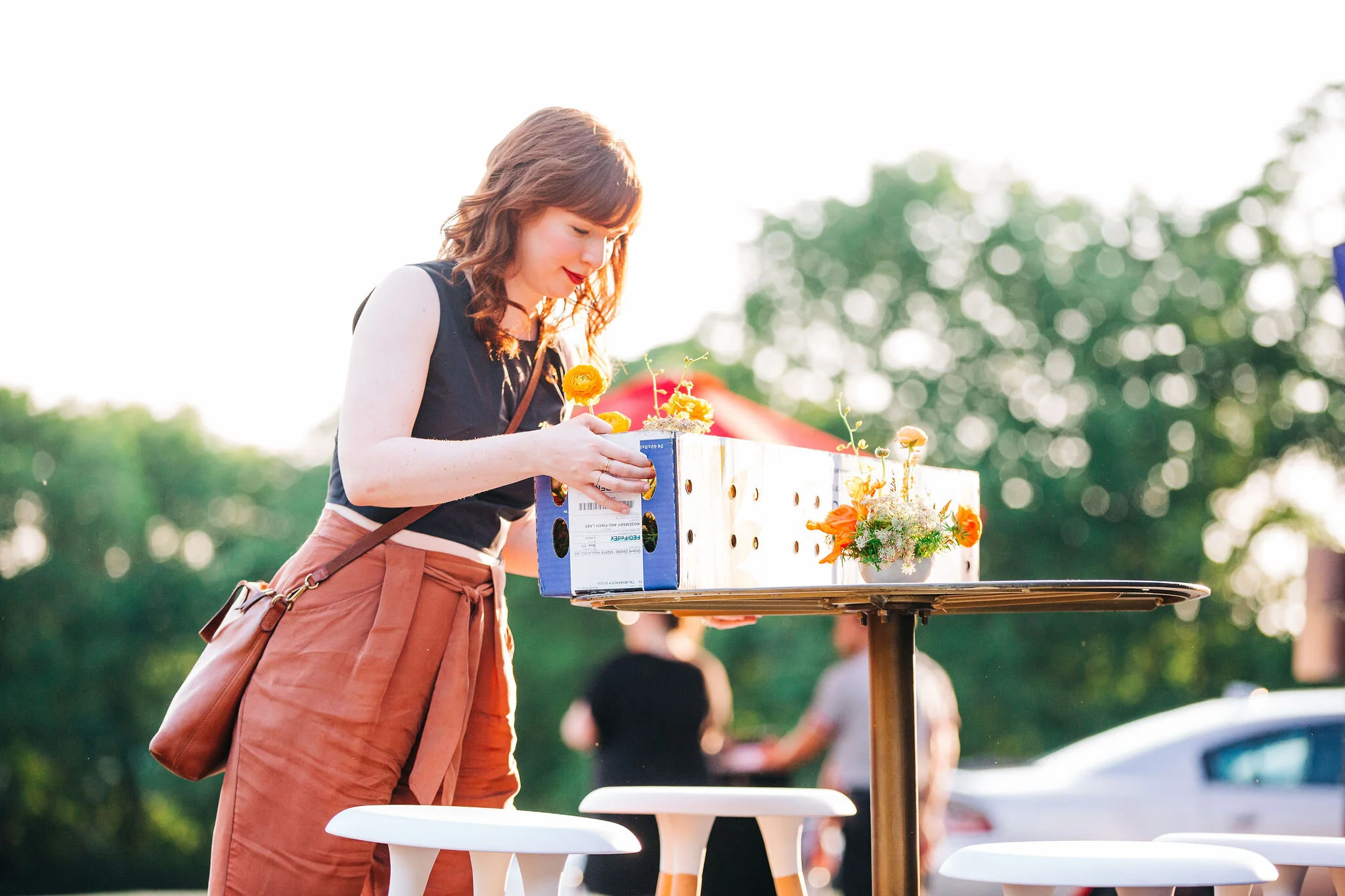 Rust orange, terra cotta, and golden yellow floral centerpieces for the CMT Songbird Supper Club 2019. Nashville event florist.