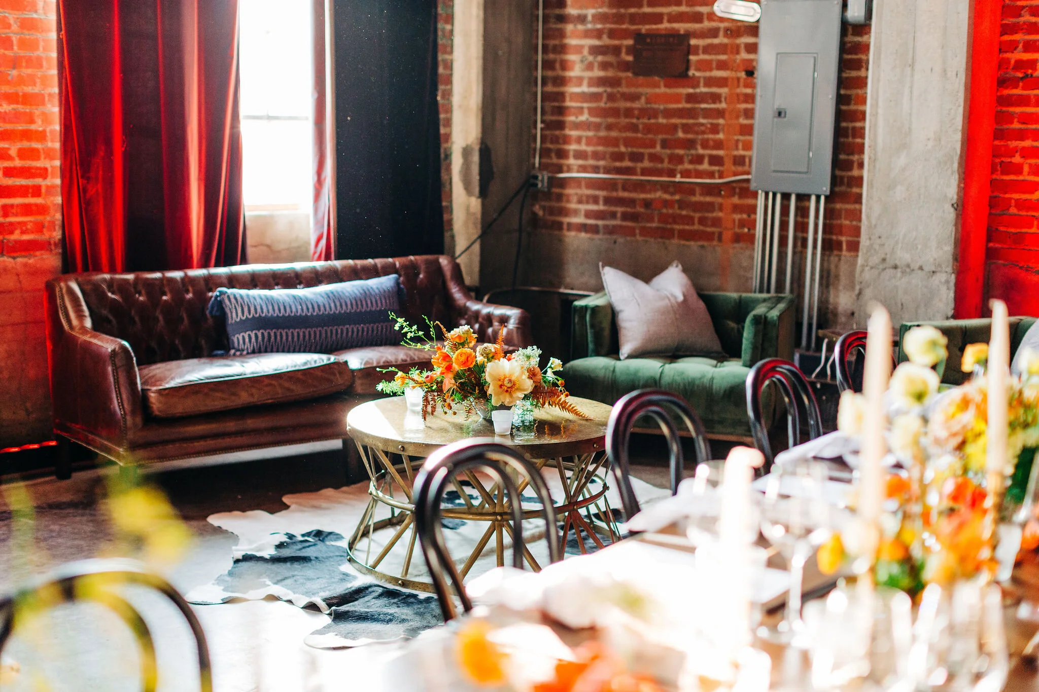 Rust orange, terra cotta, and golden yellow floral centerpieces for the CMT Songbird Supper Club 2019. Nashville event florist.